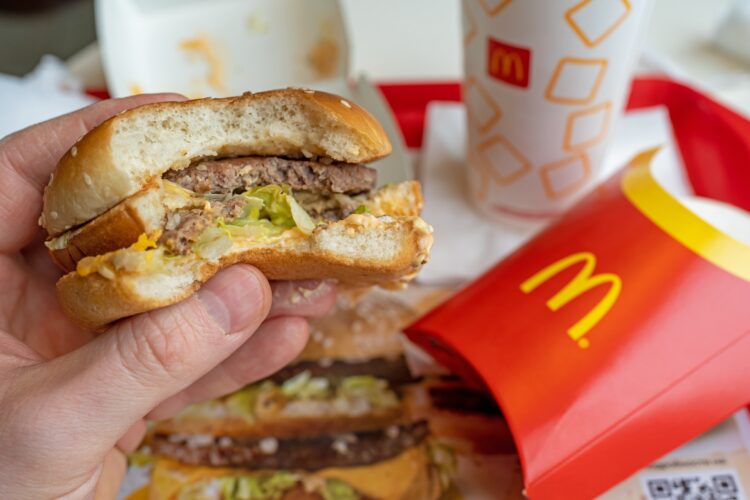 Man,Is,Eating,At,Mcdonald's,Restaurant.,Minsk,,Belarus,-,May,