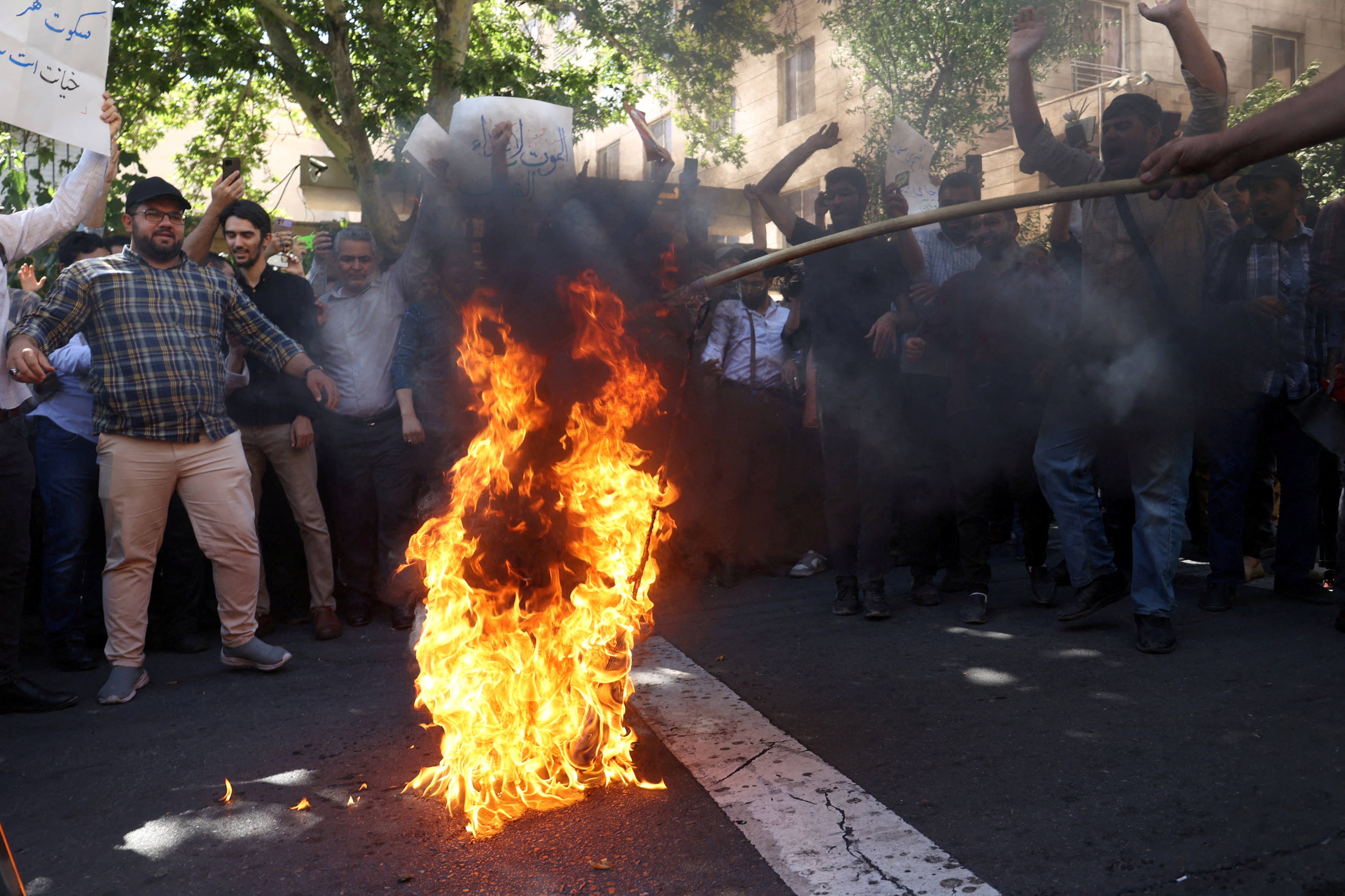FILE PHOTO: Demonstrators take part in a protest in front of the Swedish Embassy in Tehran