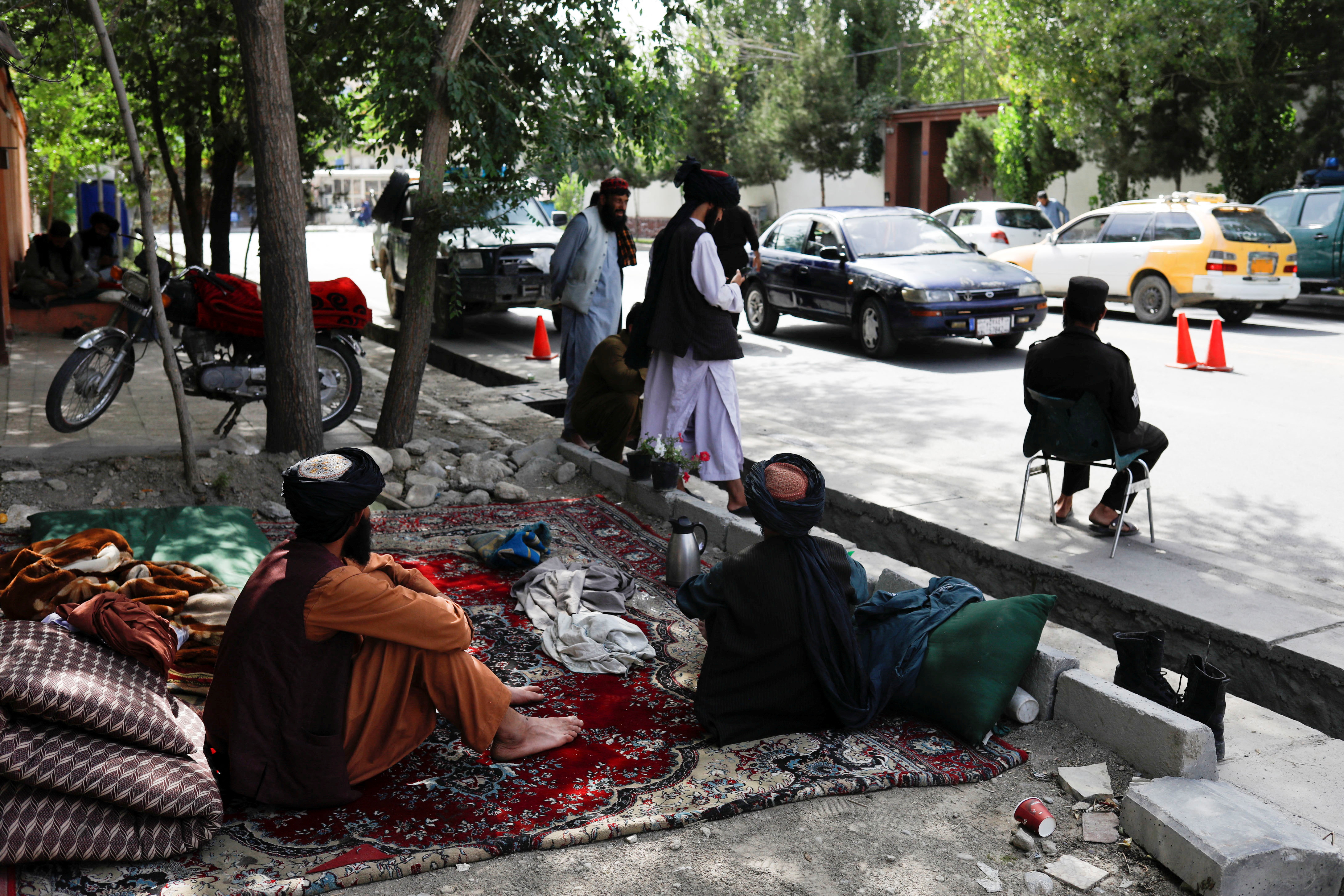 Taliban soldiers operate at a checkpoint in Kabul
