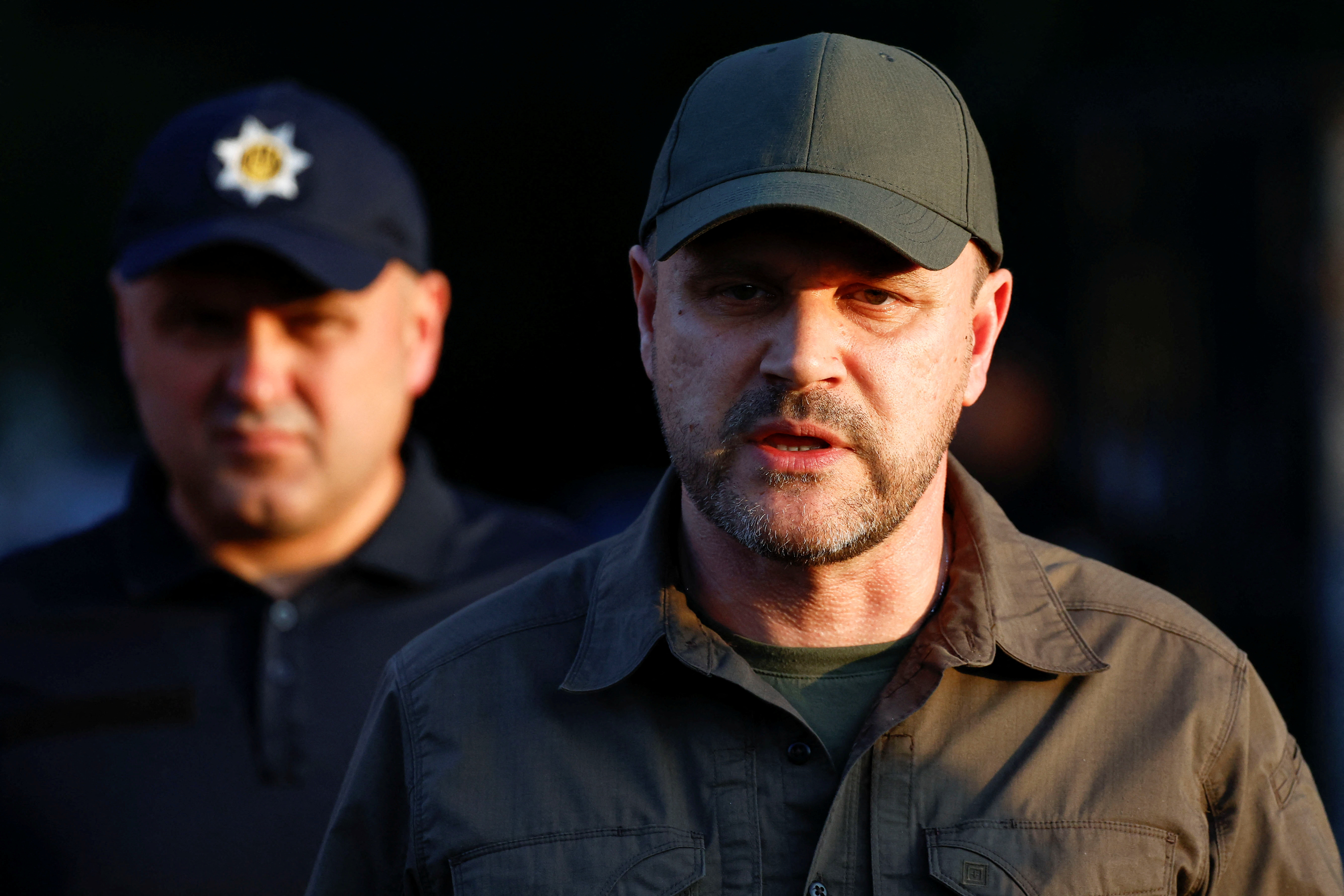 Ukraine’s Interior Minister Ihor Klymenko speaks to the media at the site of a district court, where an explosive device was allegedly activated by a man, in Kyiv