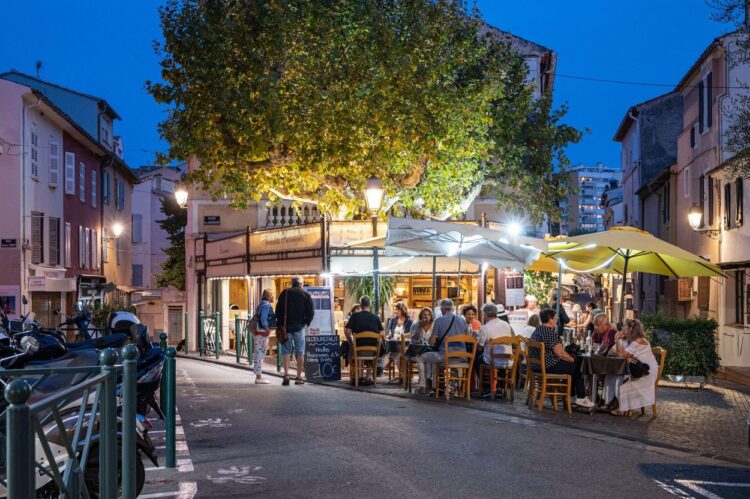 Sainte-Maxime, with peole strolling and dining in the restaurants of the seaside resort at the Cte d'Azur
