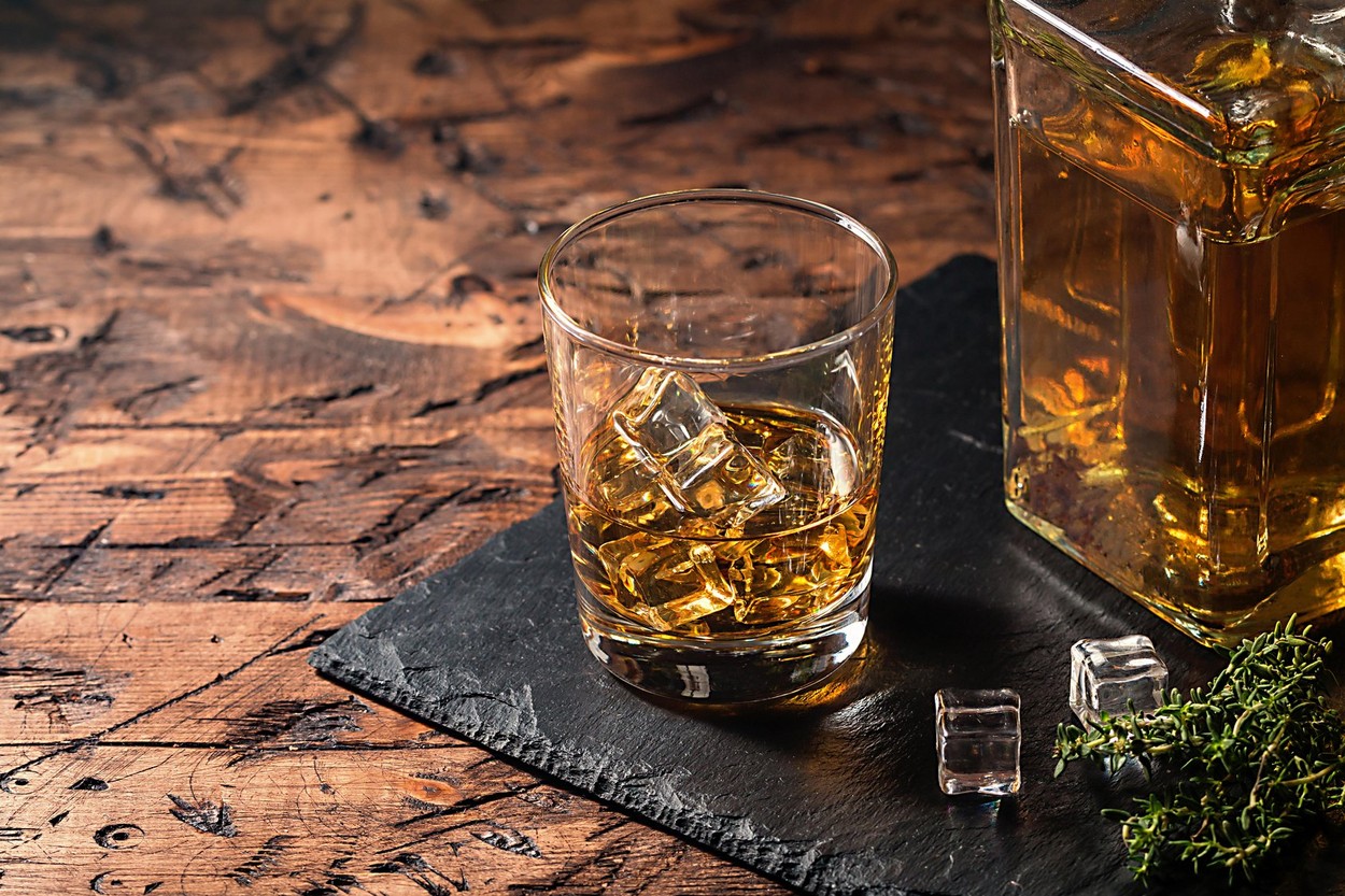 Whiskey with ice in glasses