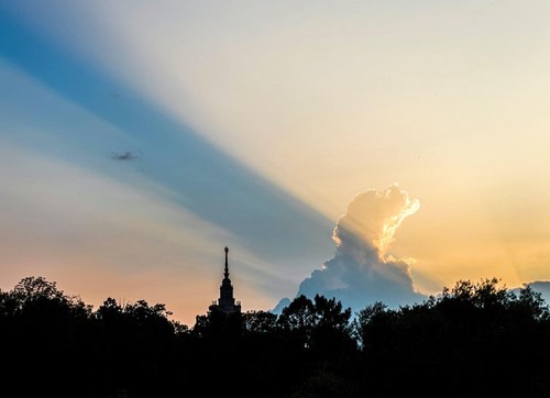 Silhouette of the Moscow University on Sparrow Hills against the background of a beautiful sunset