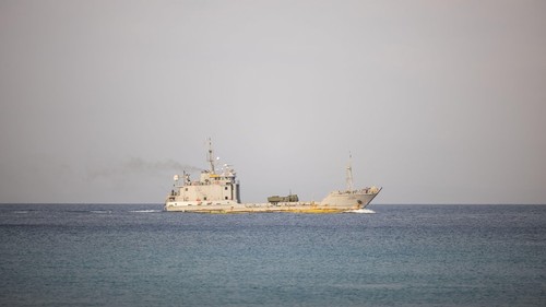 U.S. Army Landing Craft, Utility 2009, assigned to 10th Regional Support Group, transports a High Mobility Artillery Rocket System assigned to1st Multi-Domain Task Force, for a joint, bilateral, littoral campaign during Balikatan 23 off the coast of Calay