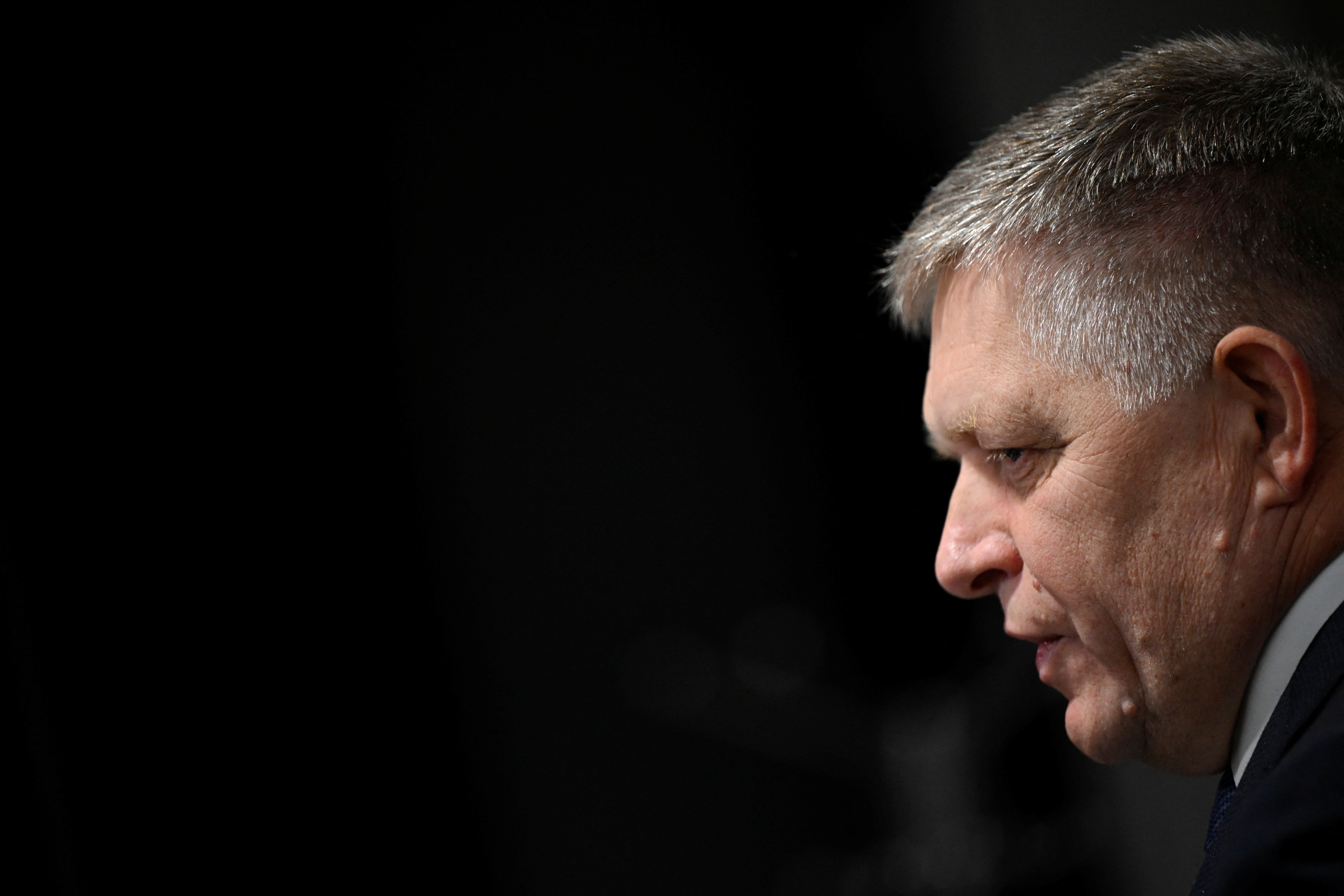 Robert Fico, leader of the SMER-SSD party, speaks with a journalist after a televised debate at TV TA3, prior to the Slovak early parliamentary election in Bratislava