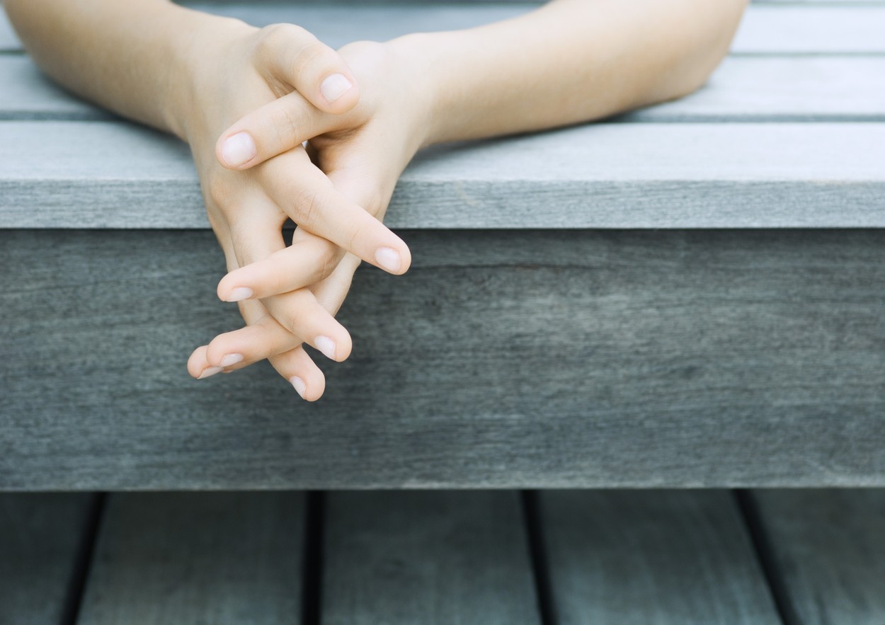 Woman's clasped hands, close-up