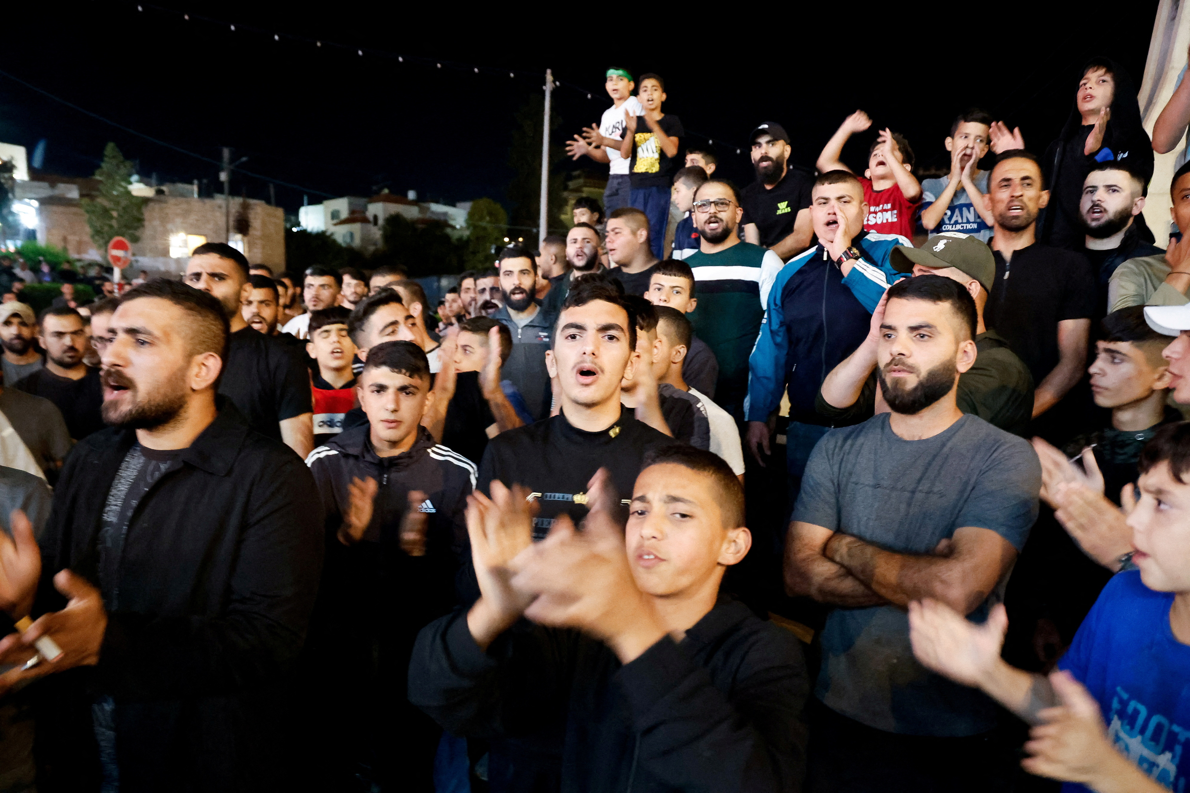 Palestinians take part in a protest in Tubas