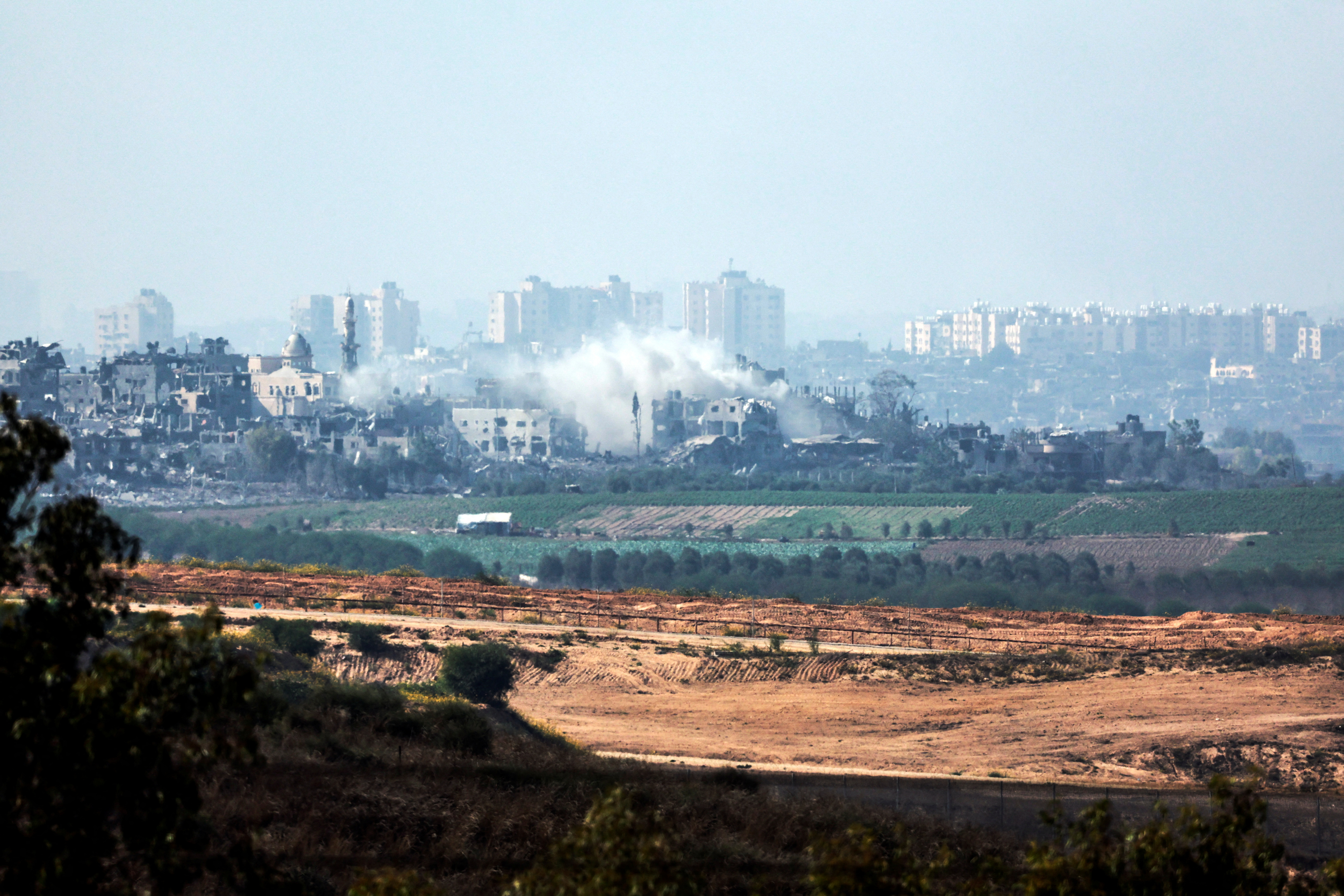 A view shows smoke in the Gaza Strip as seen from Israel's border with the Gaza Strip, in southern Israel
