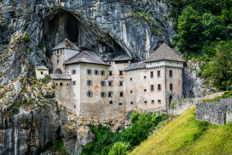 Dramatic,Scenery,Of,Medieval,Cliff,Top,Predjama,Castle,And,Caves,