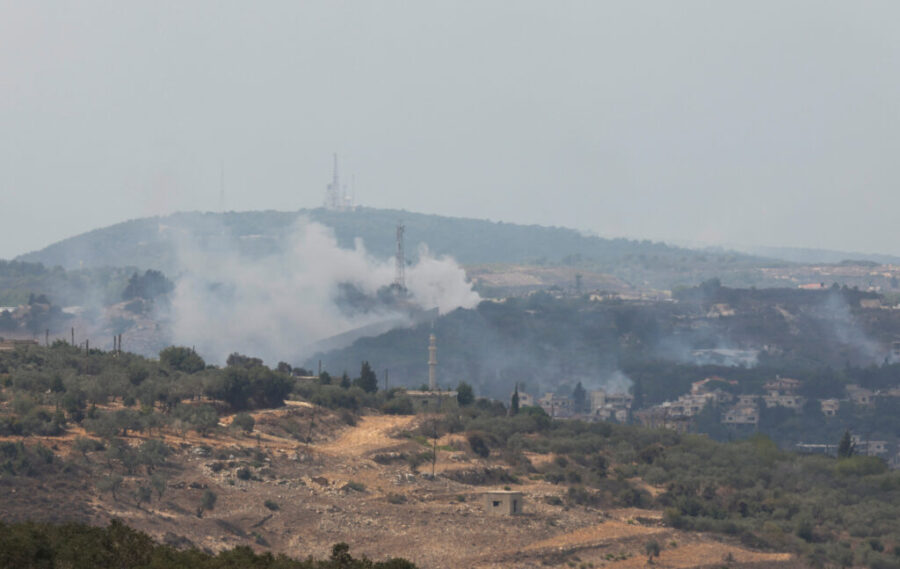 Smoke rises from Dhayra village after Israeli shelling as pictured from the Lebanese town of Marwahin
