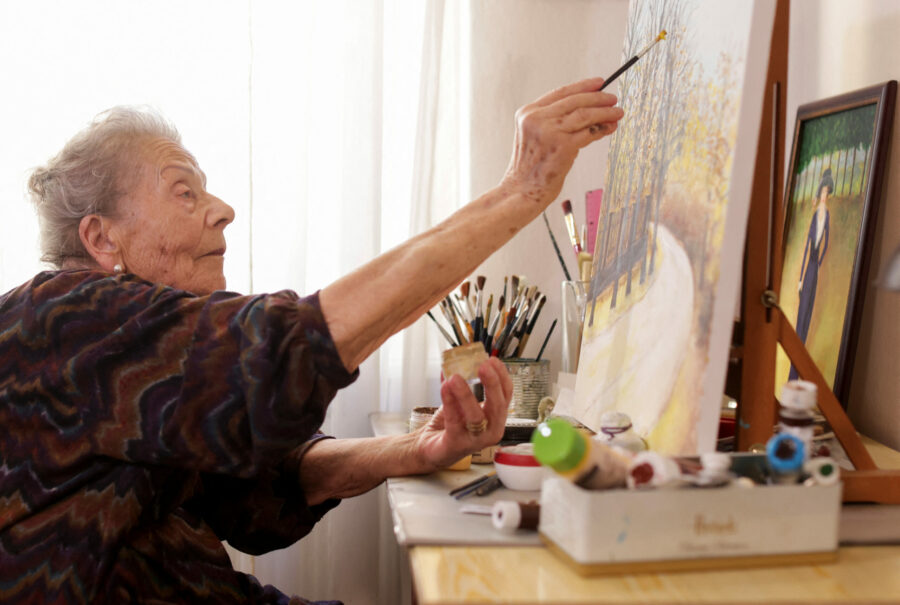 Nada Rudan, a 100-year-old self-taught Bosnian painter, in her home in Sarajevo