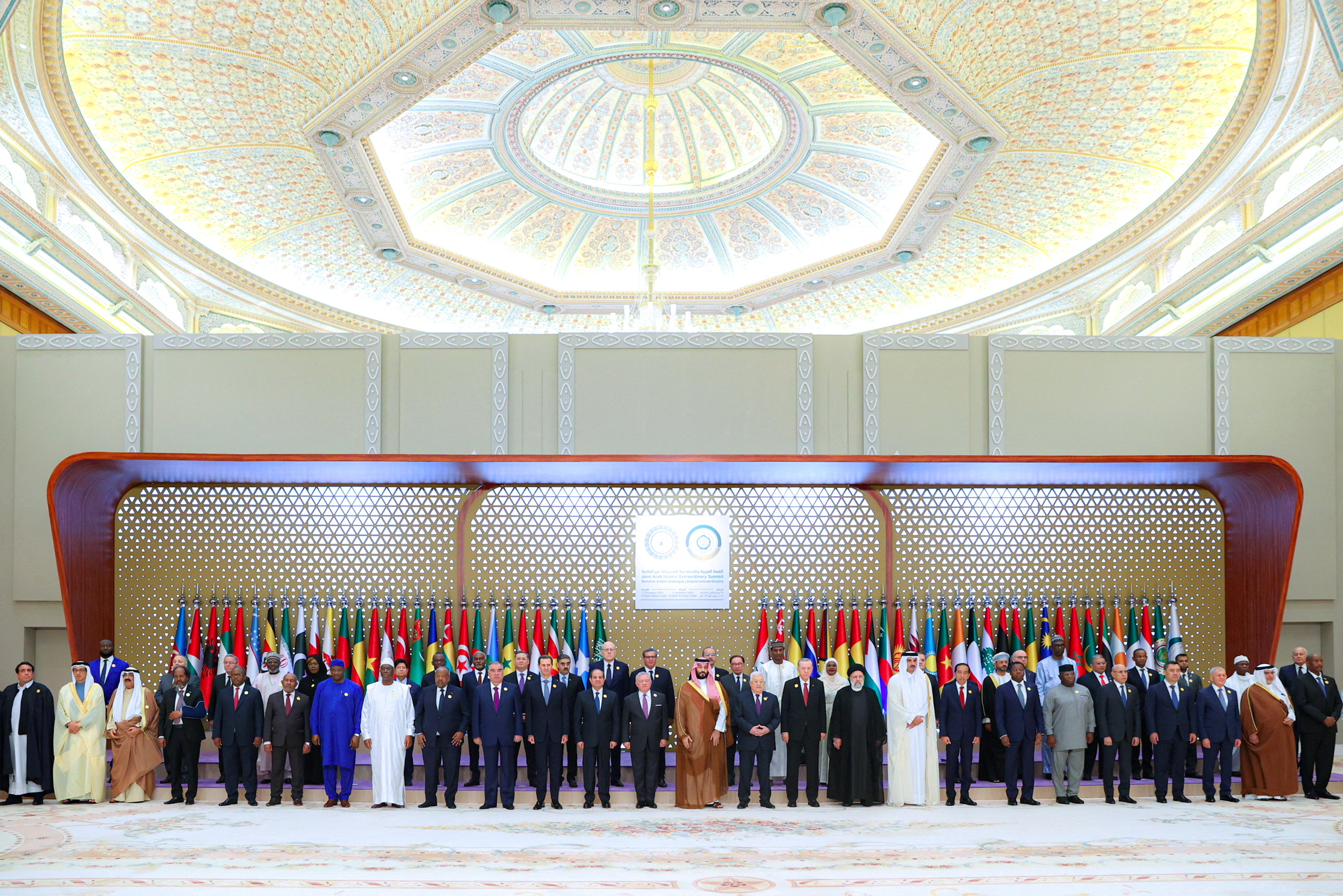 Country leaders pose for a picture during the special Arab leaders' summit to discuss the ongoing conflict between Israel and the Palestinian militant group Hamas in Gaza, in Riyadh
