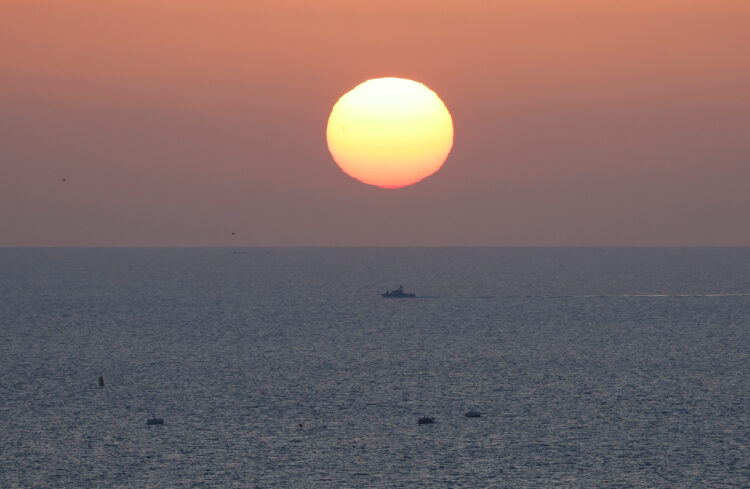 Israeli naval boat patrols along the coast of the Mediterranean sea in Southern Israel, near the Israel-Gaza border