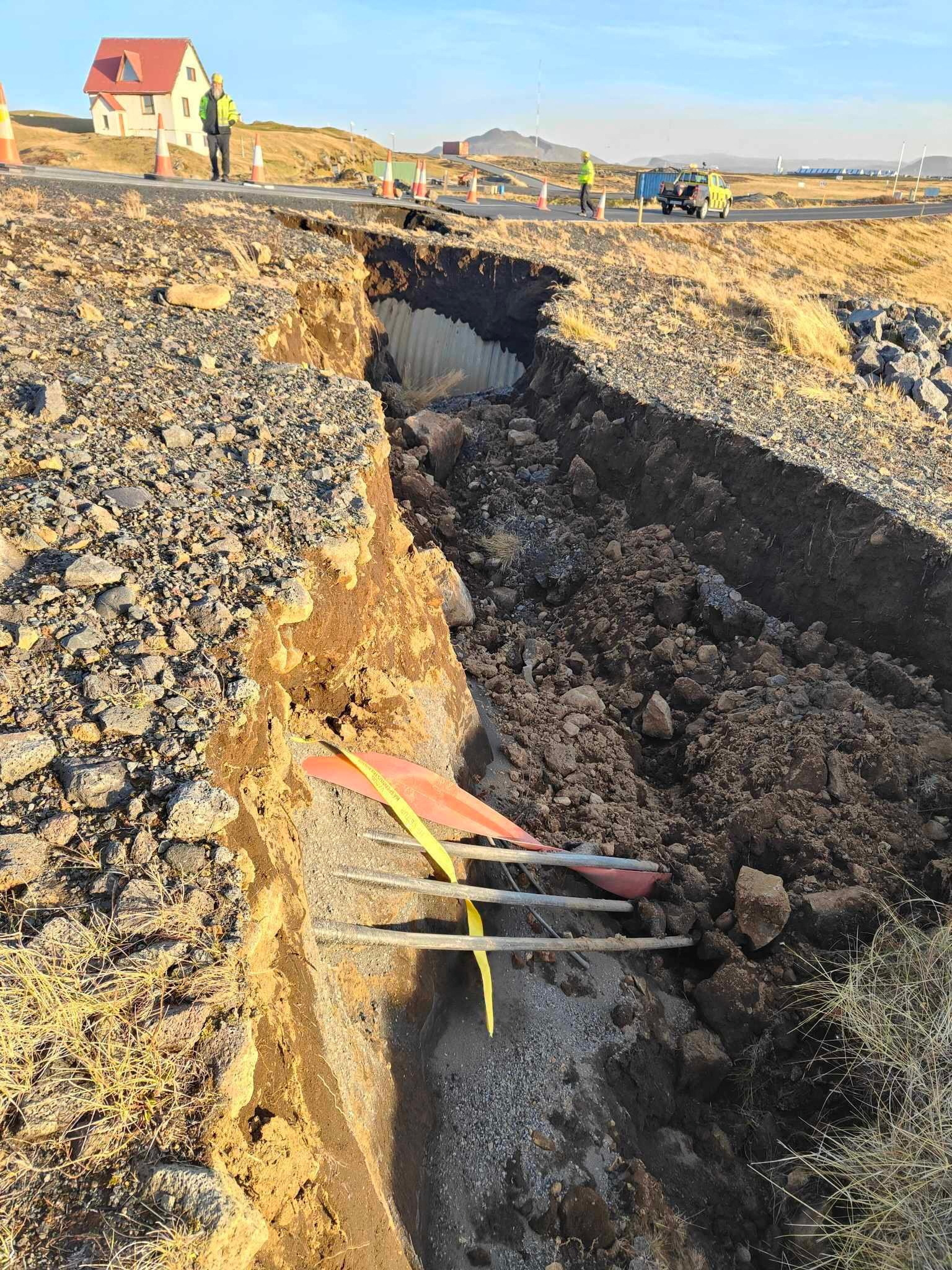 A view of cracks, emerged on a road due to volcanic activity, near Grindavik