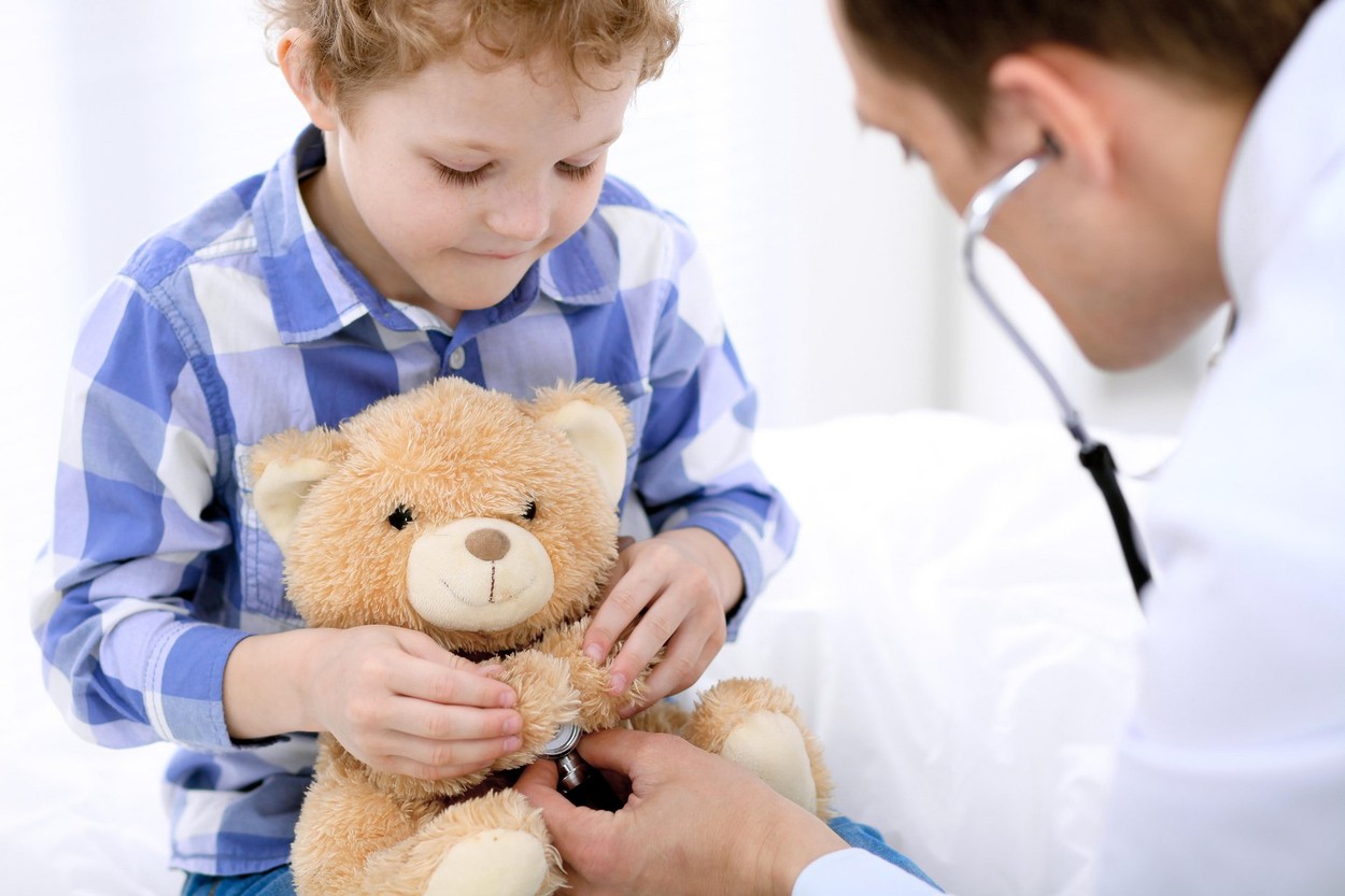 Doctor examining a child  patient by stethoscope