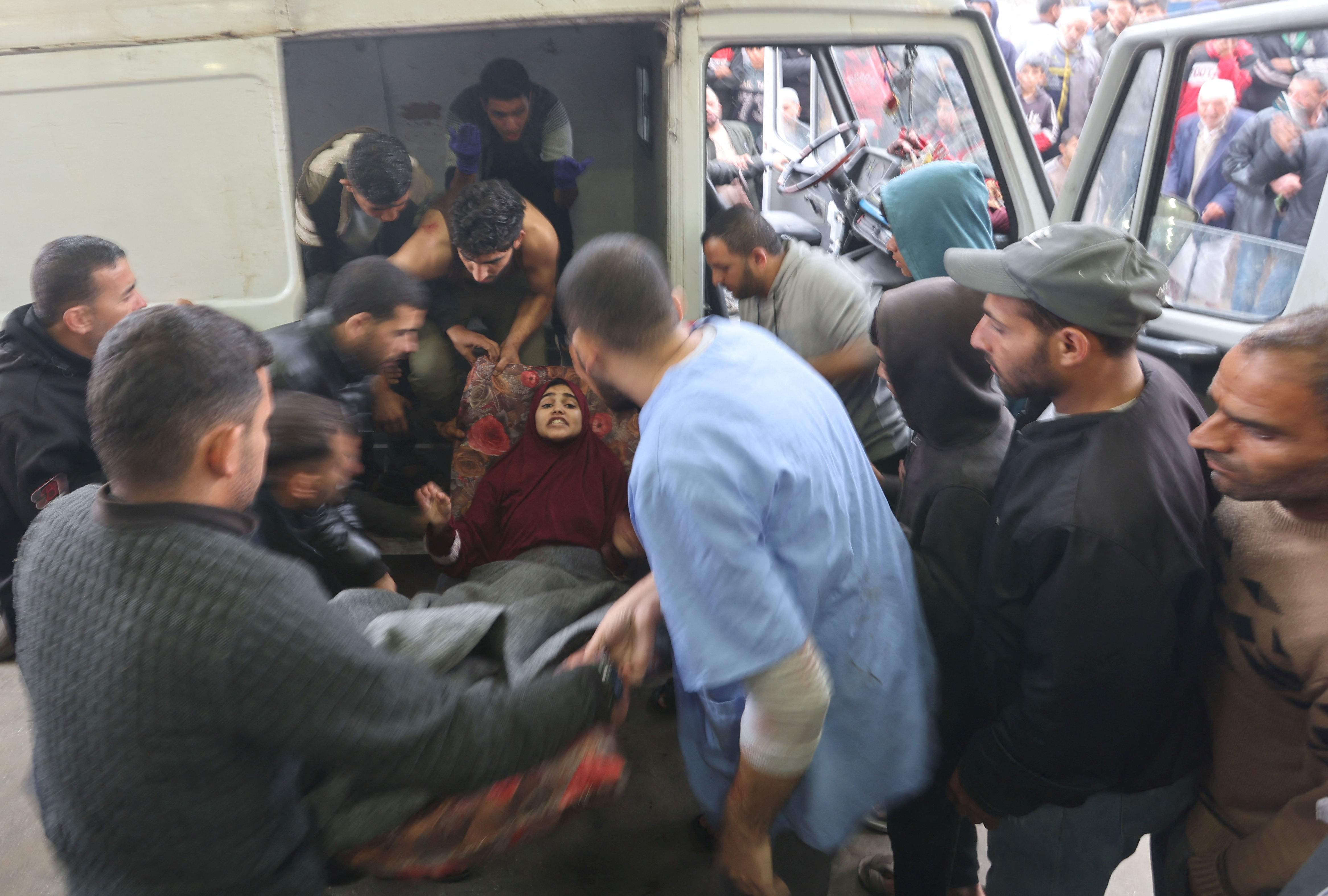 Wounded Palestinians are rushed into Nasser hospital, in Khan Younnis