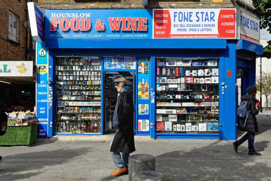 A corner shop selling a large range of varied types of goods in Hounslow High Street London England UK