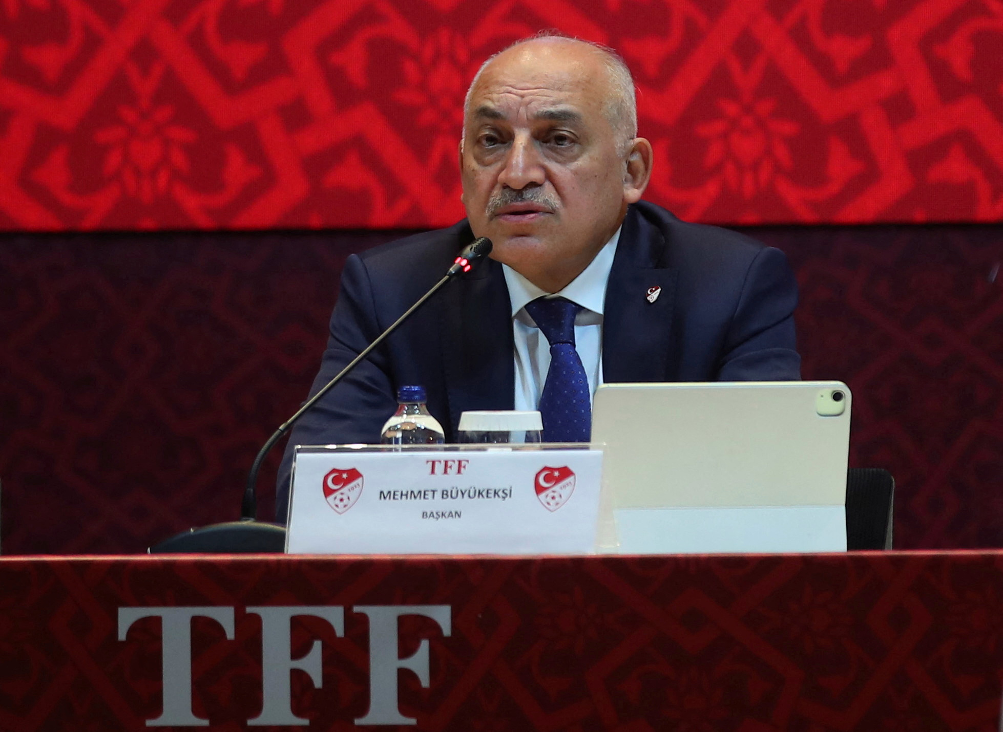 TFF Chairman Buyukeksi talks during a news conference in Istanbul