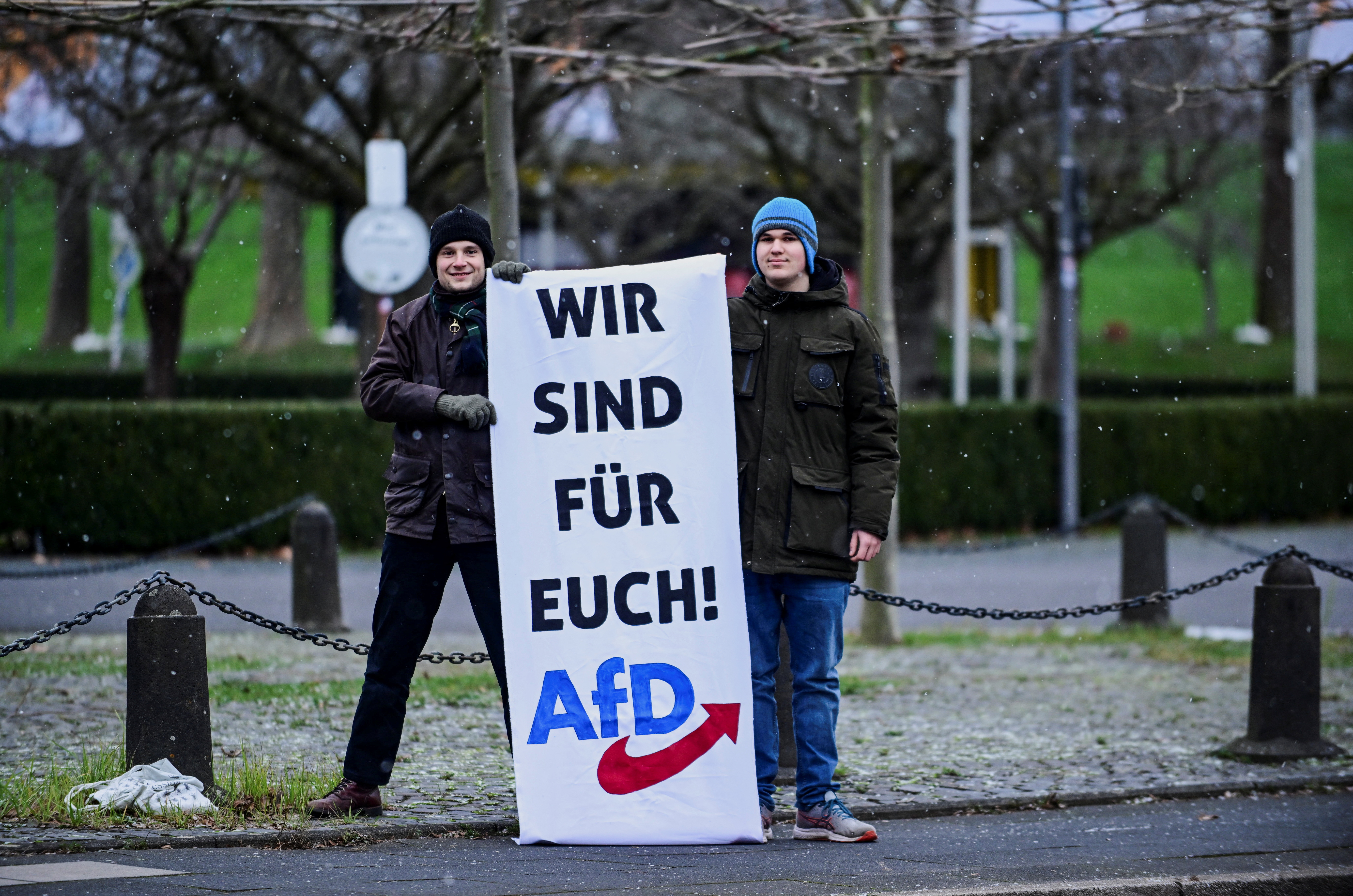 German farmers take part in a protest against the cut of vehicle tax subsidies
