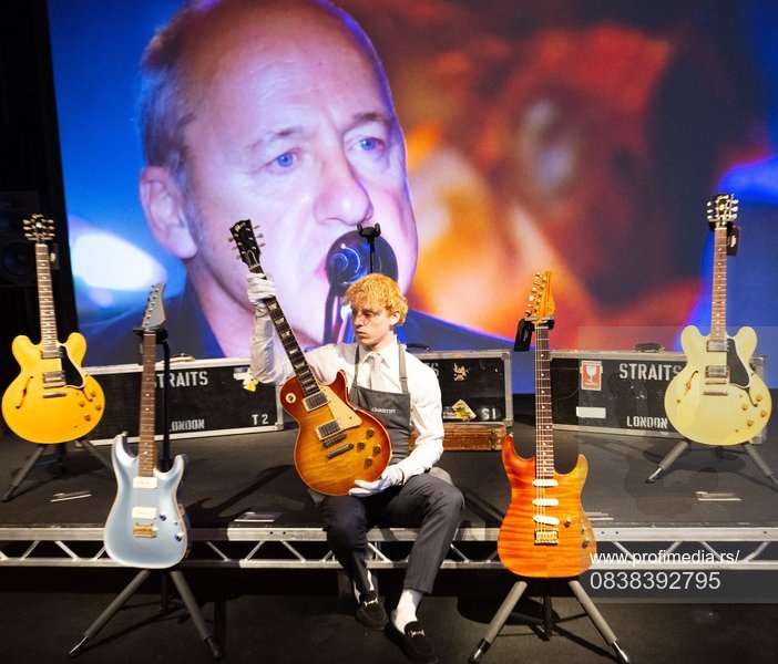Press photocall for Mark Knopfler guitar collection at Christie's, London, UK.