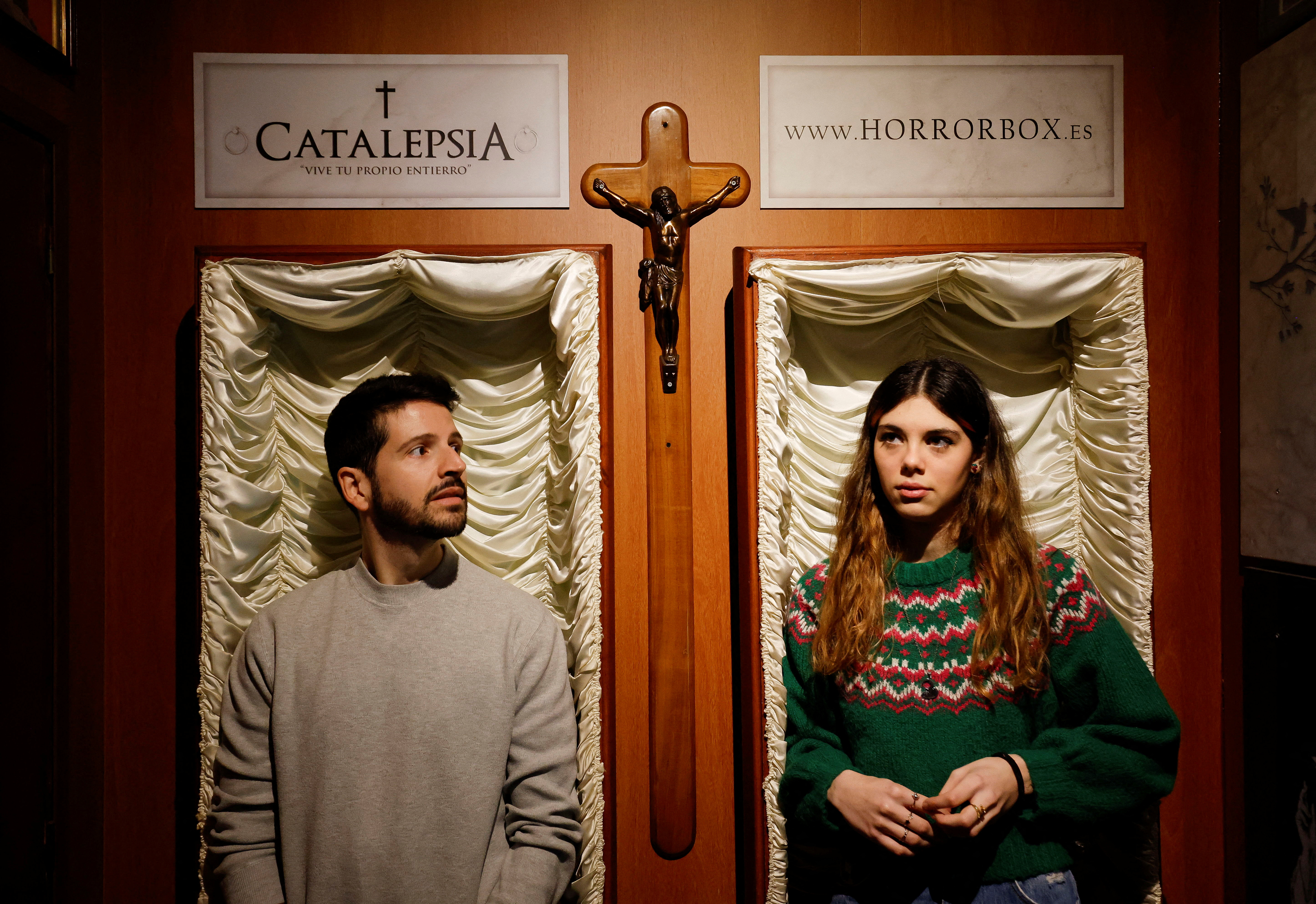 Gamers play an extreme escape room named Catalepsia inside coffins, in Barcelona
