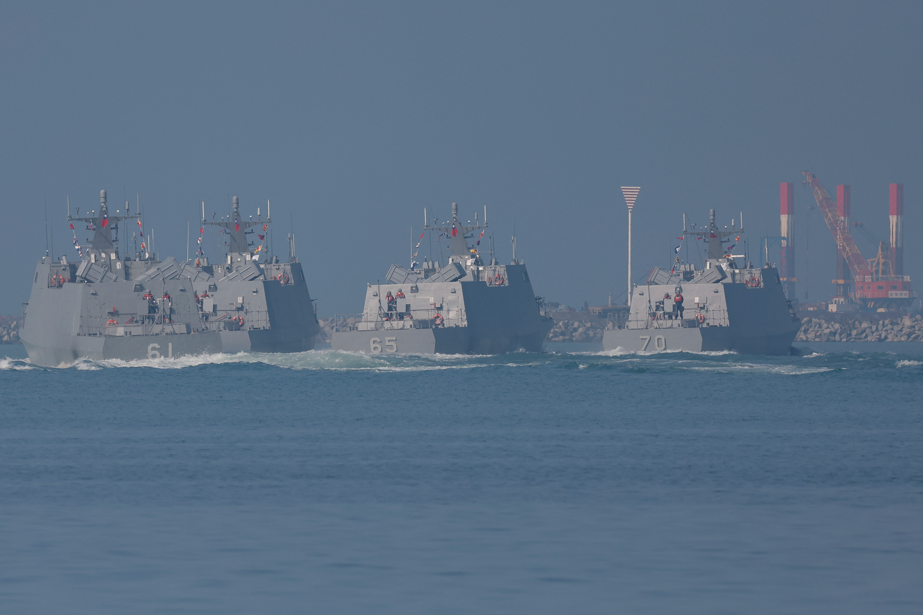 Members of Taiwan's Navy in a drill part of a demonstration for the media at a navy base in Kaohsiung