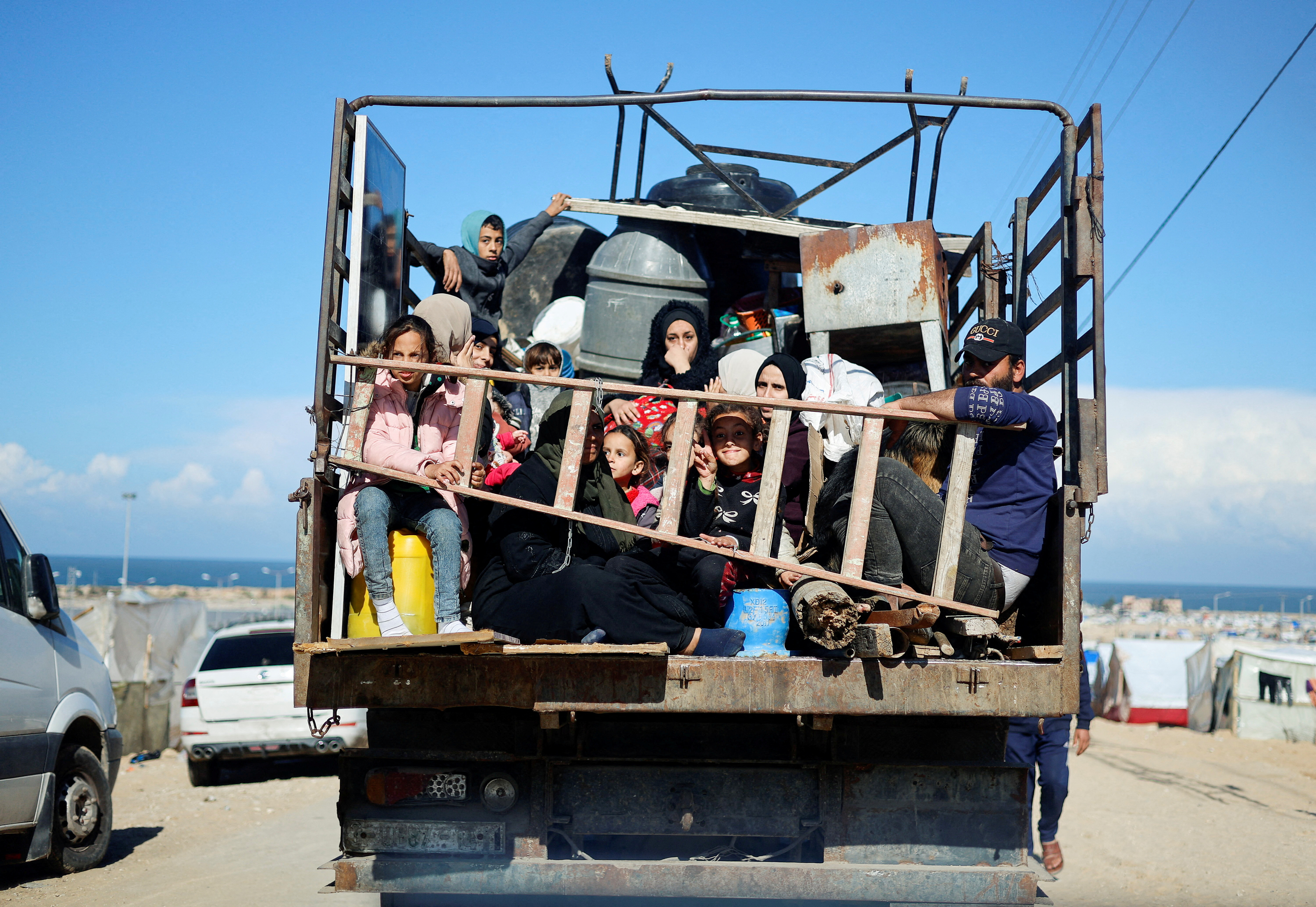 Displaced Palestinians fleeing Khan Younis due to the Israeli ground operation, move towards Rafah