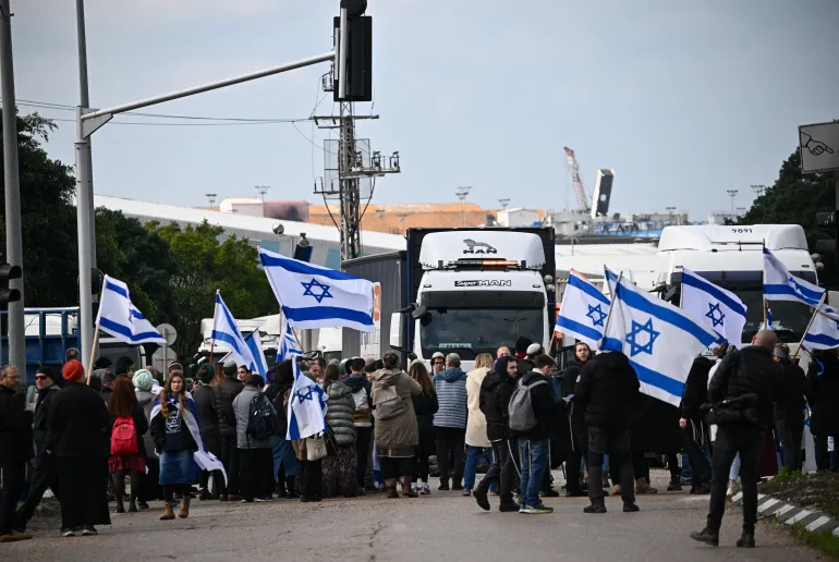 2024-02-01T090251Z_843569366_RC2JT5AMJ1T5_RTRMADP_3_ISRAEL-PALESTINIANS-AID-PROTEST-1707218583