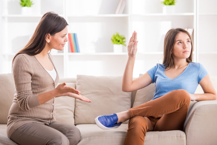 Teen,Girl,Is,Showing,Stop,Gesture,To,Angry,Mother,While