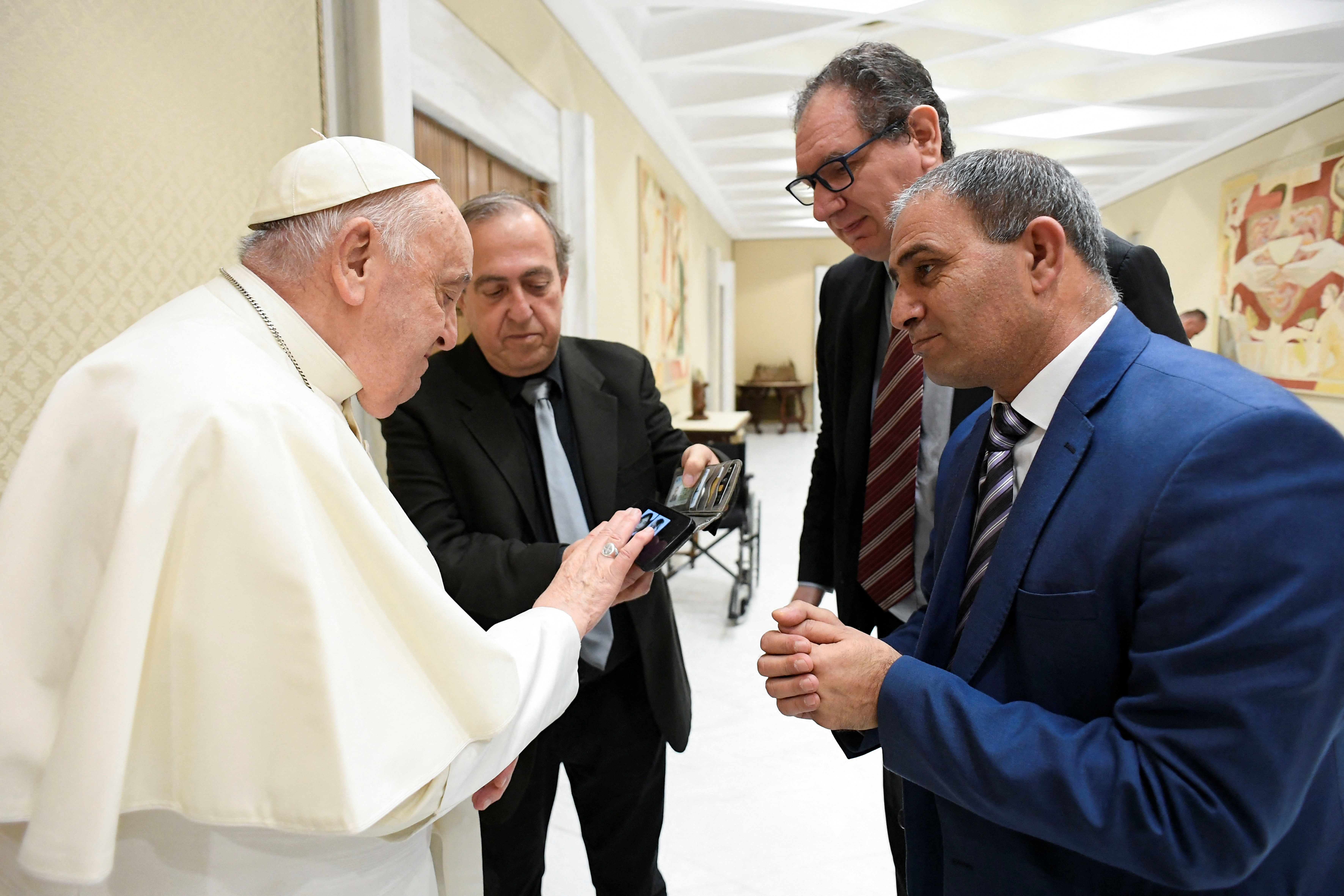 Pope Francis meets Bassam Aramin and Rami Elhanan, each of whom lost a daughter in the Israeli-Palestinian conflict, in Vatican City