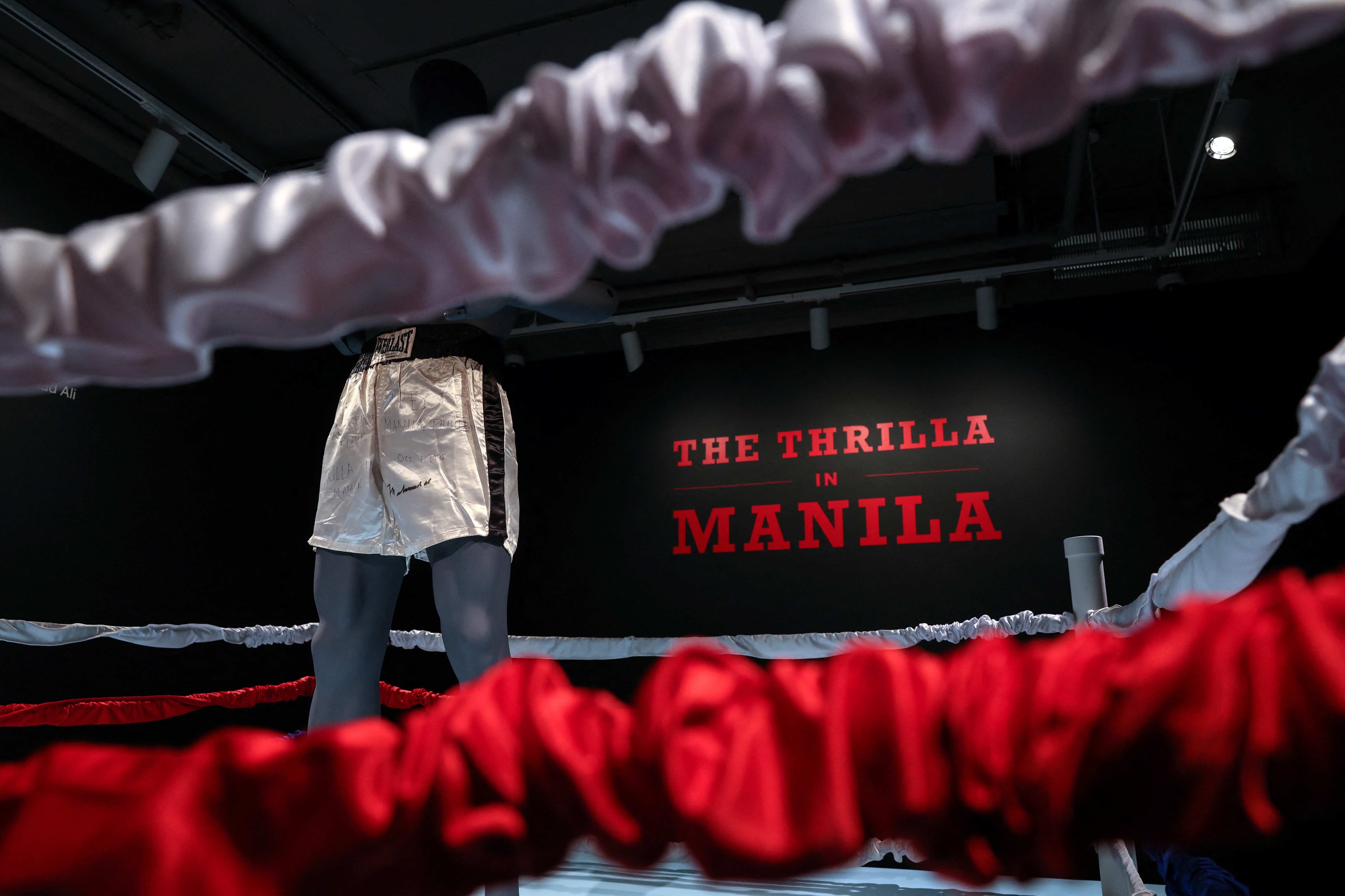 Muhammad Ali's boxing trunks from the 1975 'Thrilla in Manila' boxing match with Joe Frazier, stand on display at Sotheby's auction house in New York City