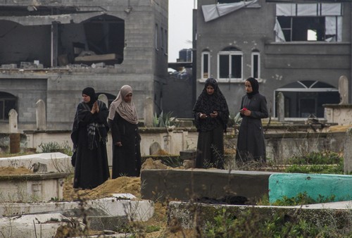 Palestinians in Gaza visit cemeteries during Eid al-Fitr amid Israeli attacks