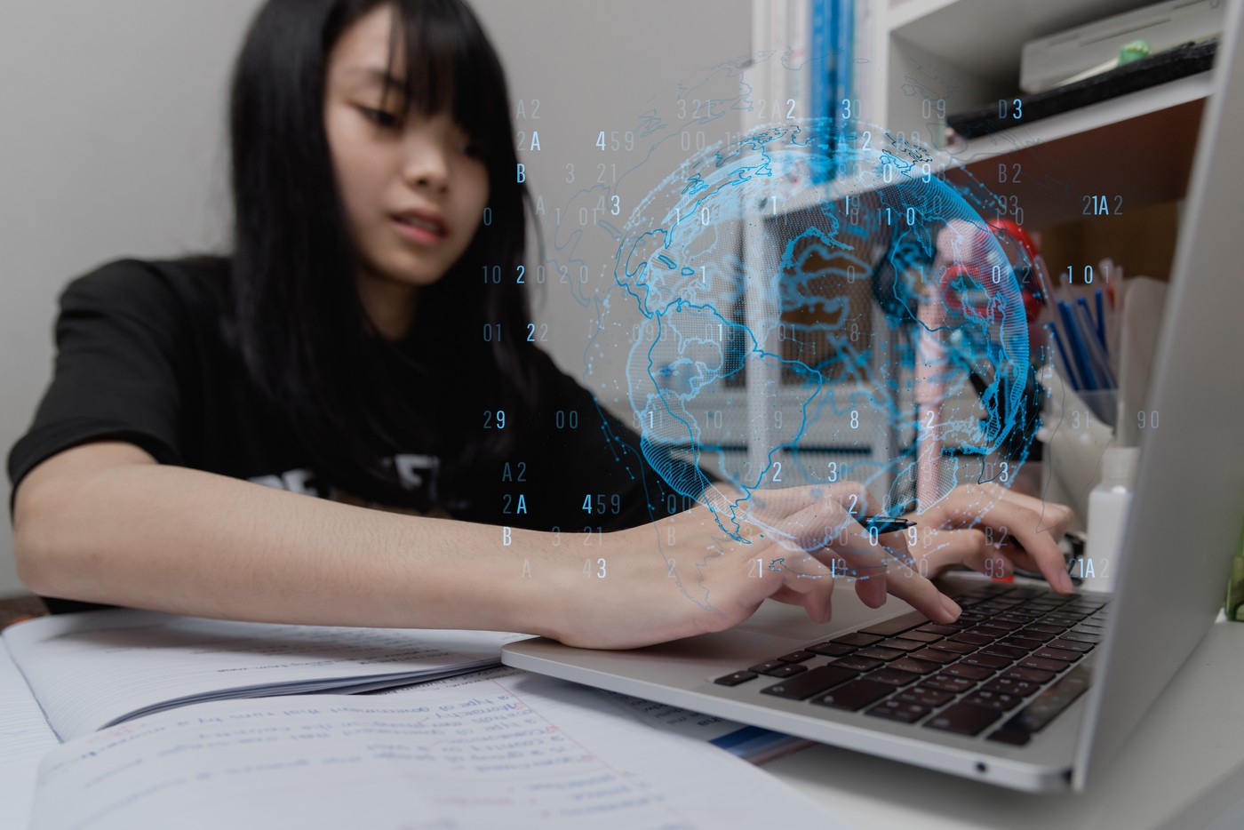 Girl e learning using computer laptop education technology digital internet network online.