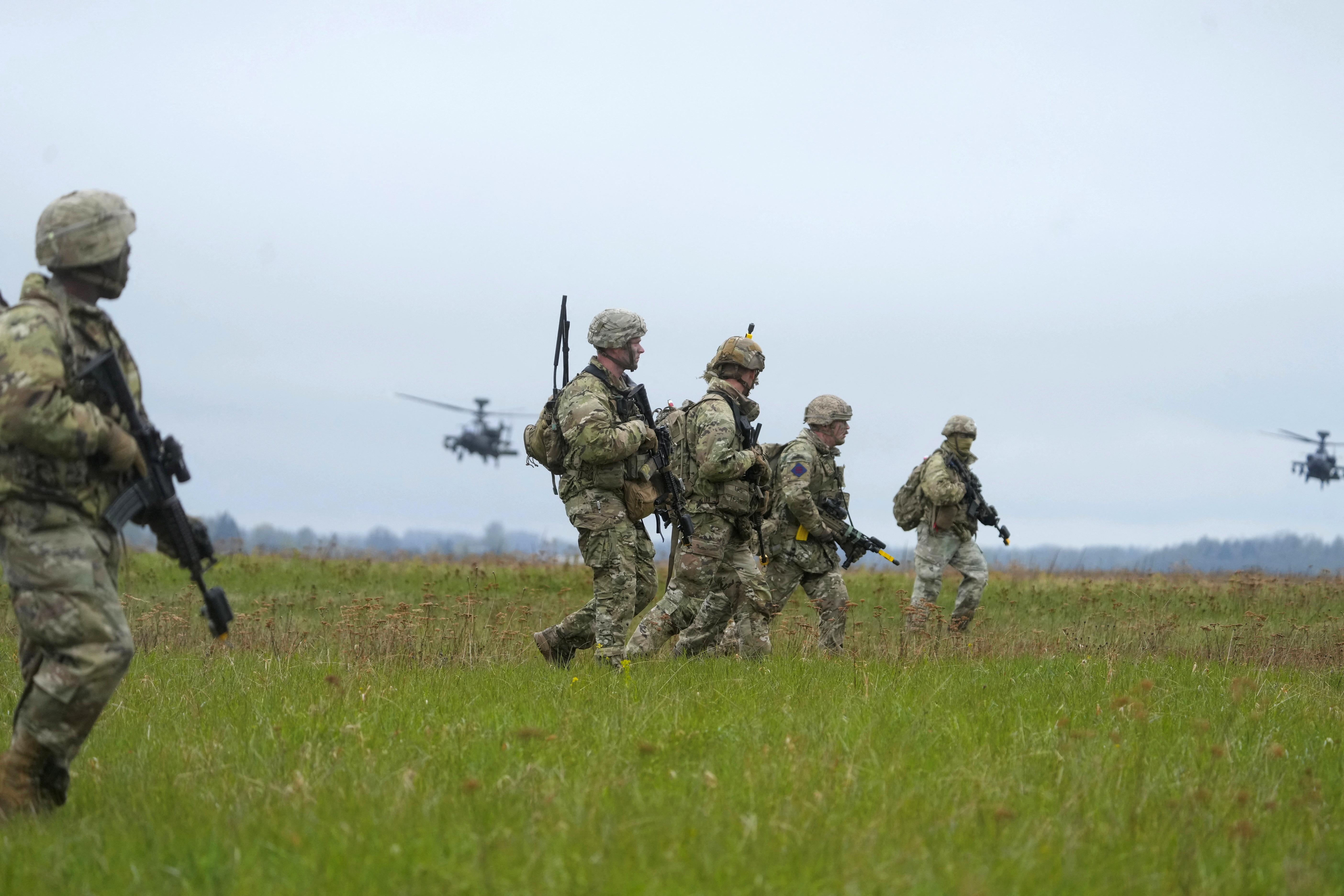 British and U.S. paratroopers attend Swift Response military exercise near Nurmsi