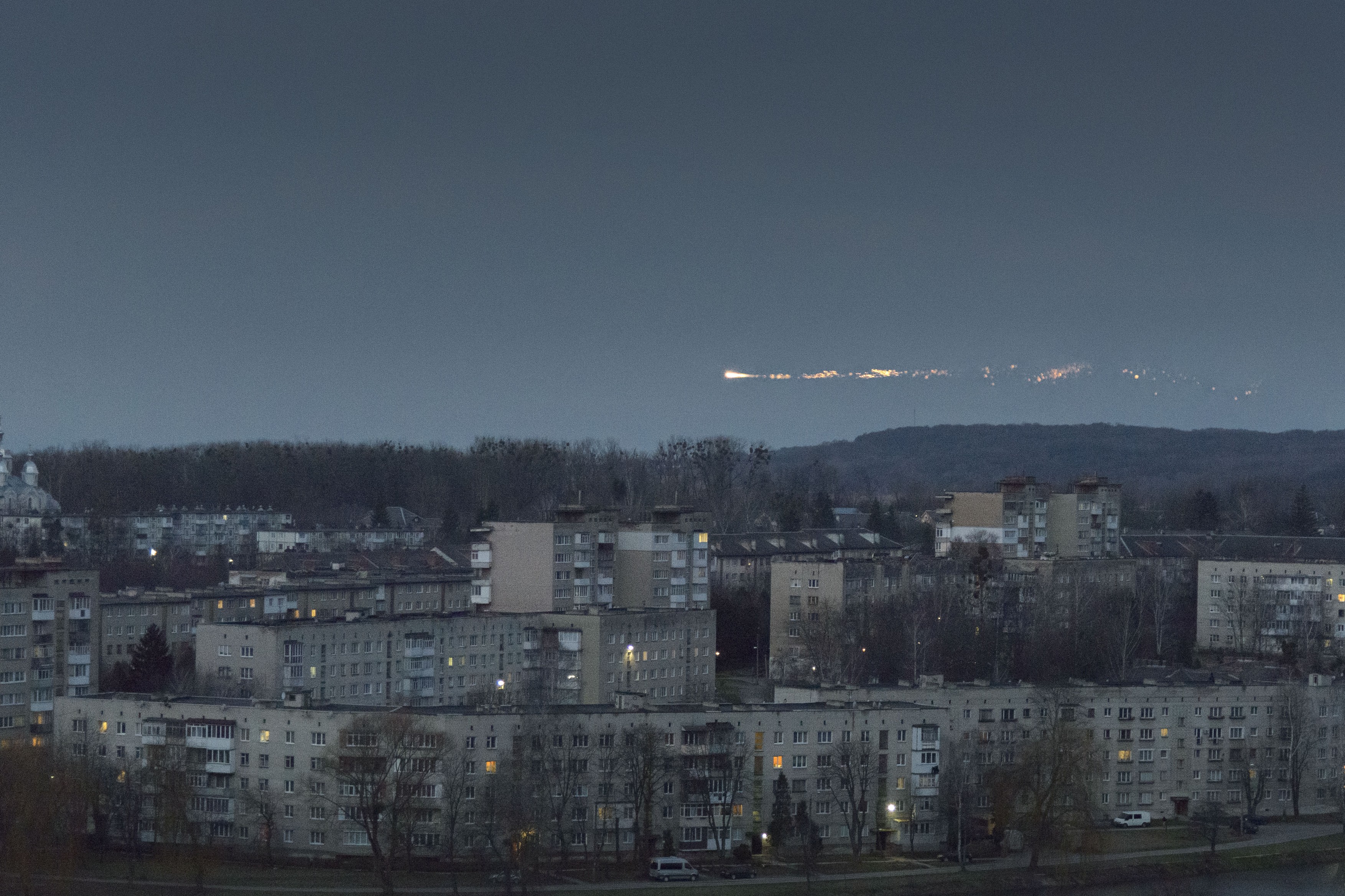 A Russian Missile Shot Down by an Air Defense System Flies Over a Residential Area