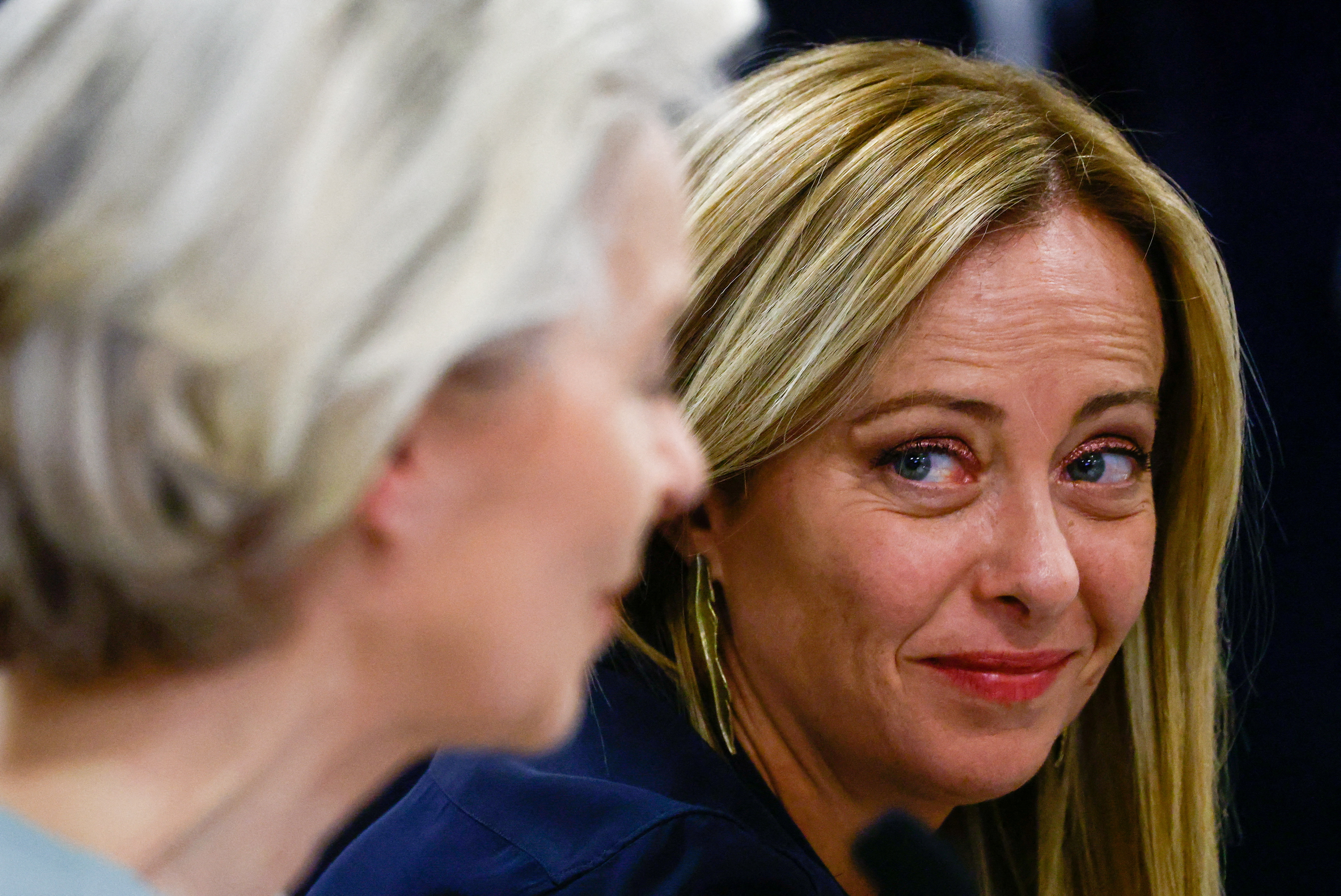 FILE PHOTO: EU chief Ursula von der Leyen and Italian PM Giorgia Meloni visit Lampedusa