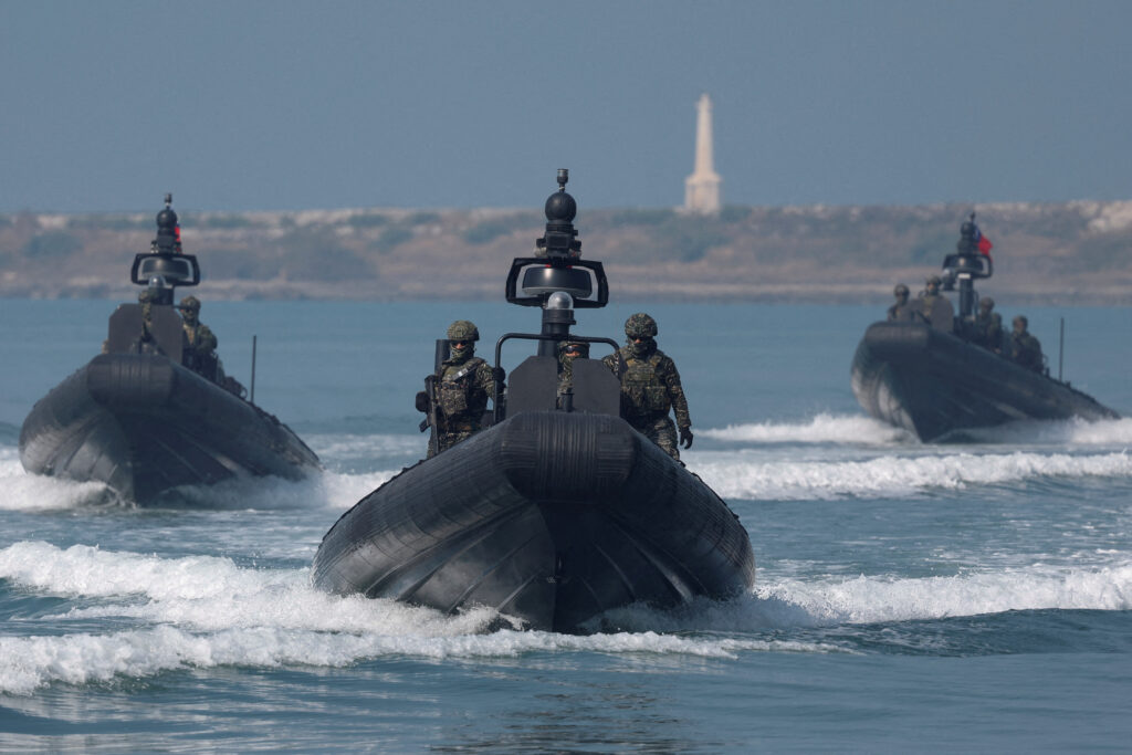 FILE PHOTO: Members of Taiwan's Navy in a drill part of a demonstration for the media at a military base in Kaohsiung