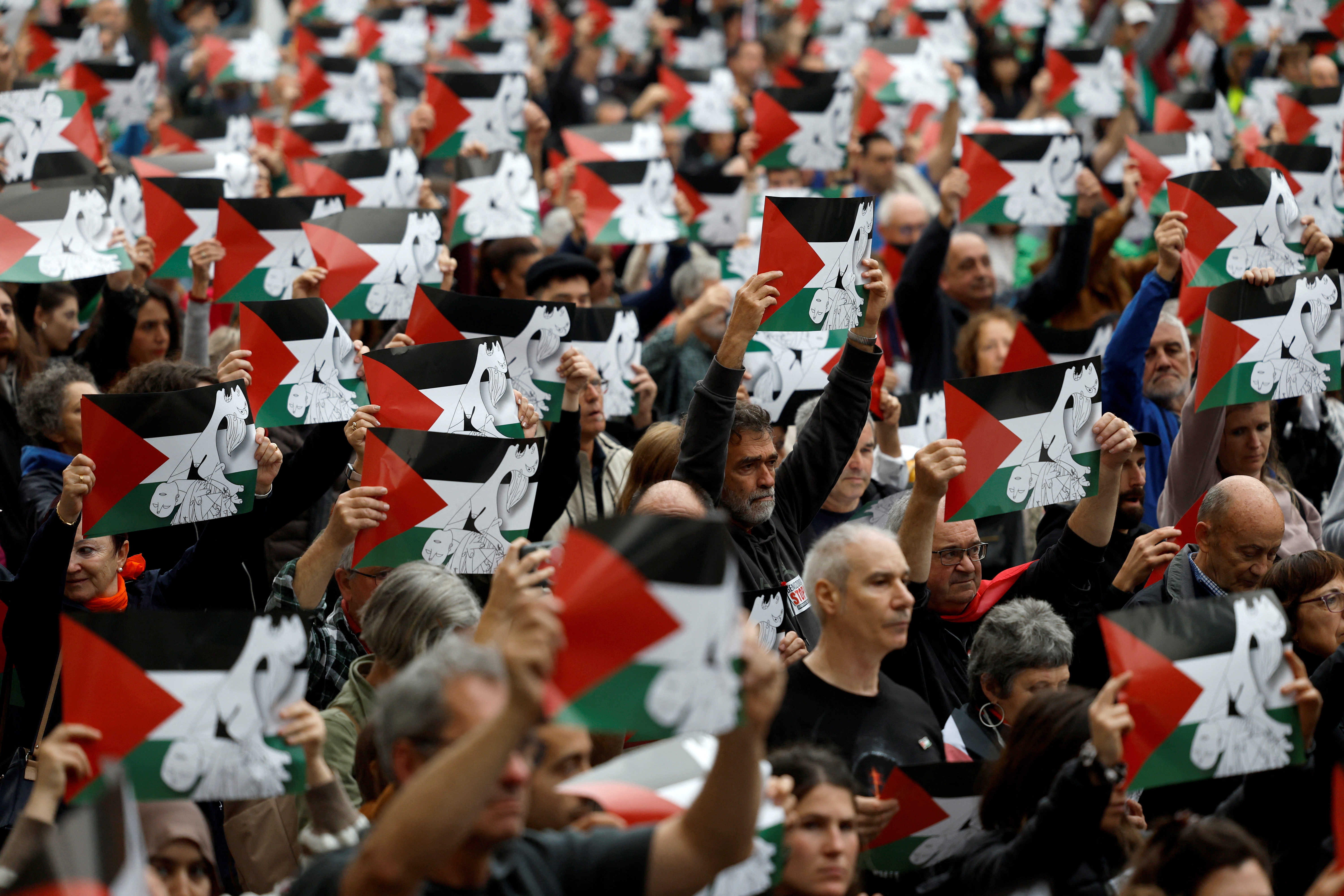 Hundreds of protesters lie down to mimic Gaza casualties at Bilbao's Guggenheim museum