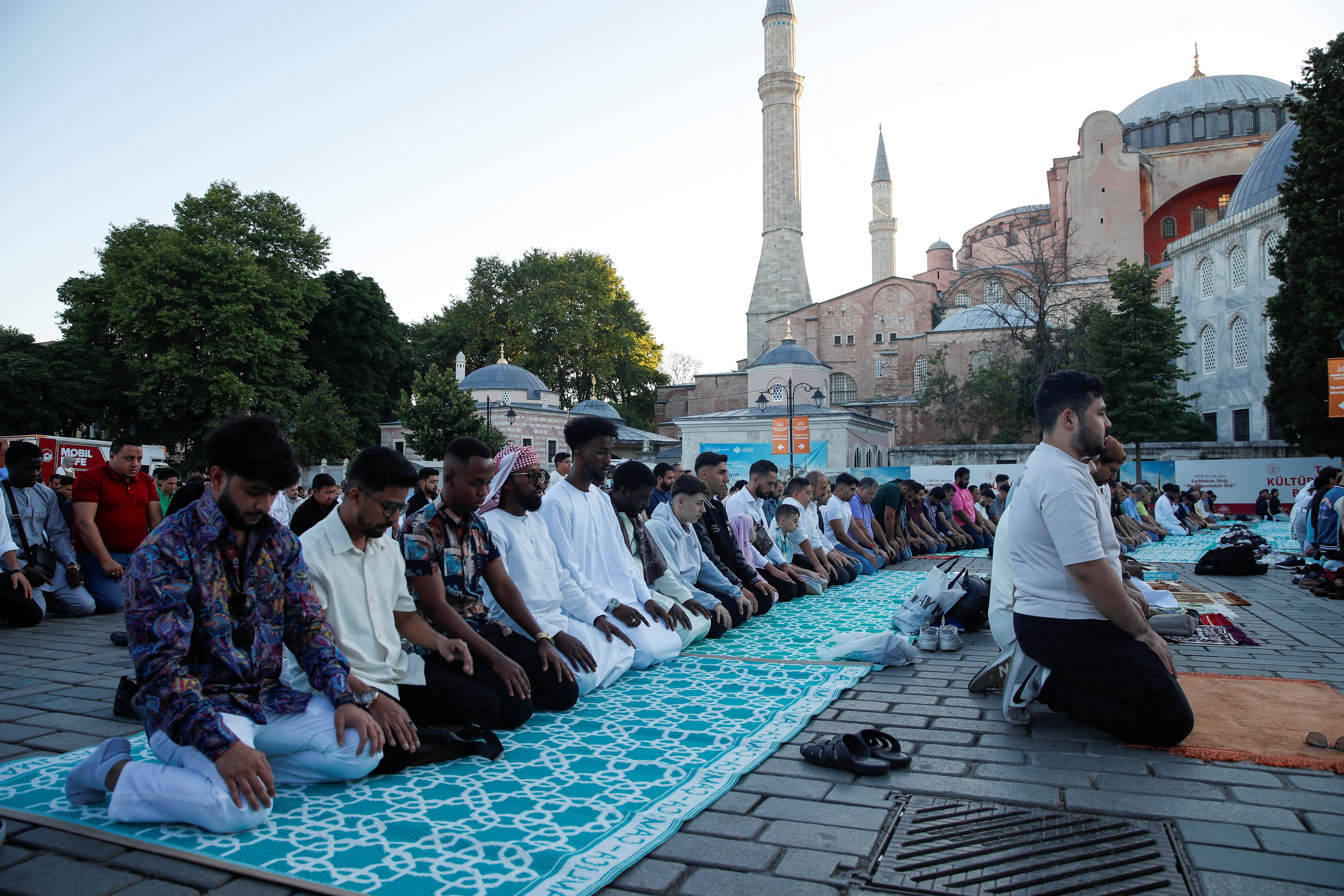 Worshippers attend Eid al-Adha prayers outside the Hagia Sophia Grand Mosque in Istanbul