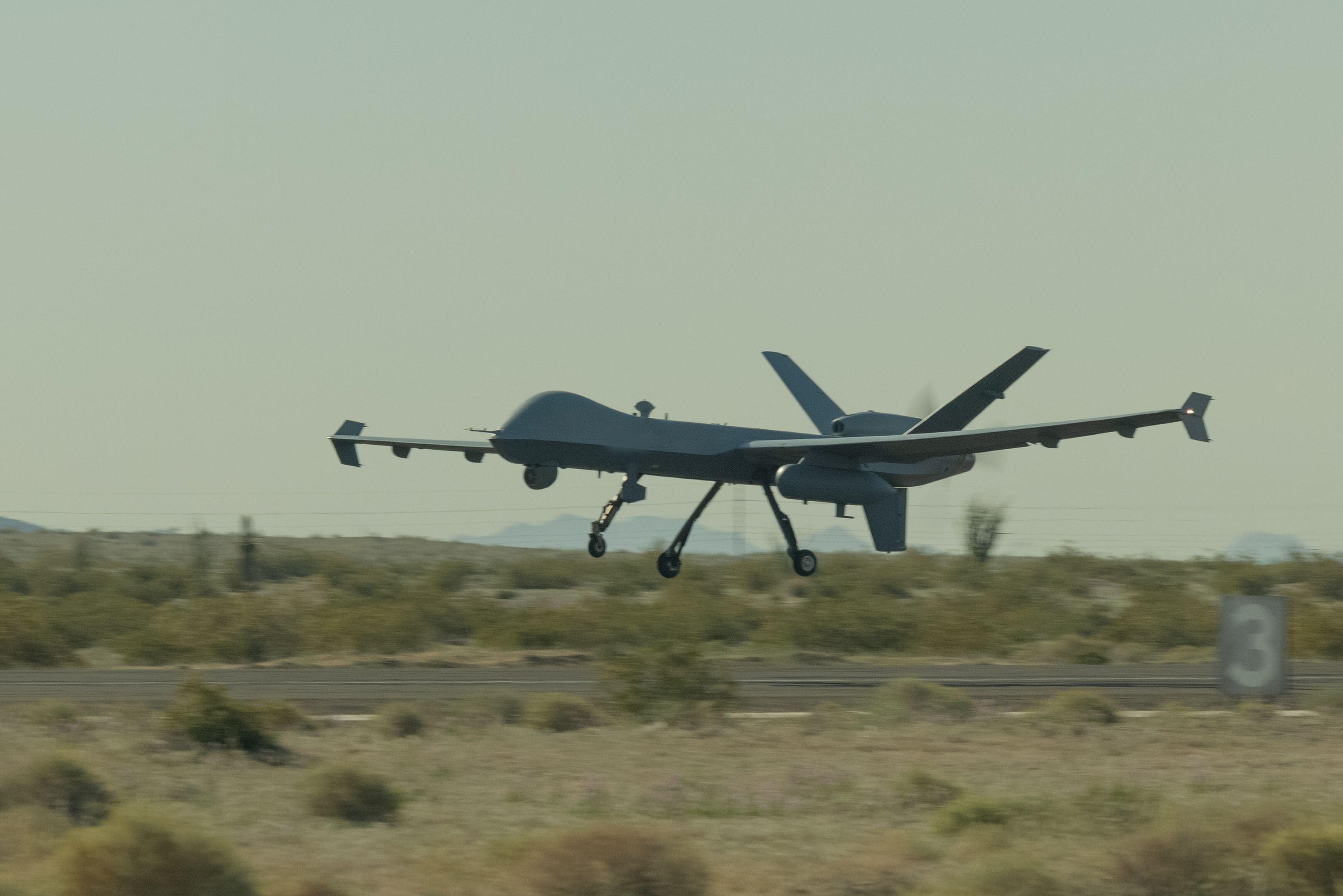 A U.S. Marine Corps MQ-9 Reaper drone, assigned to Marine Aviation Weapons and Tactics Squadron One, prepares to takeoff during unmanned aerial system tactics training as part of Weapons and Tactics Instructor course 2-24, at Laguna Army Airfield, Arizona