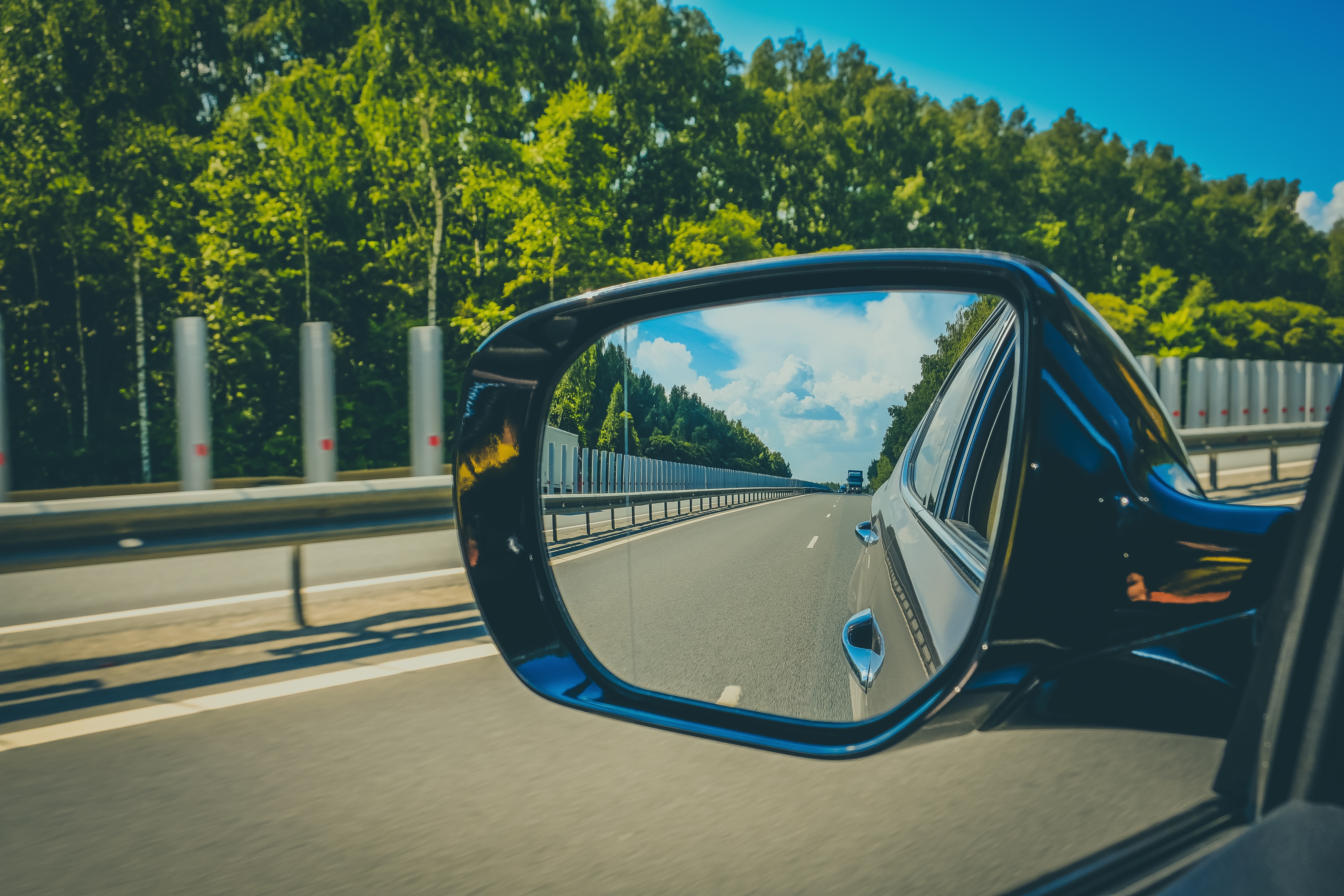 Look,In,The,Rear,View,Mirror,Of,A,Car