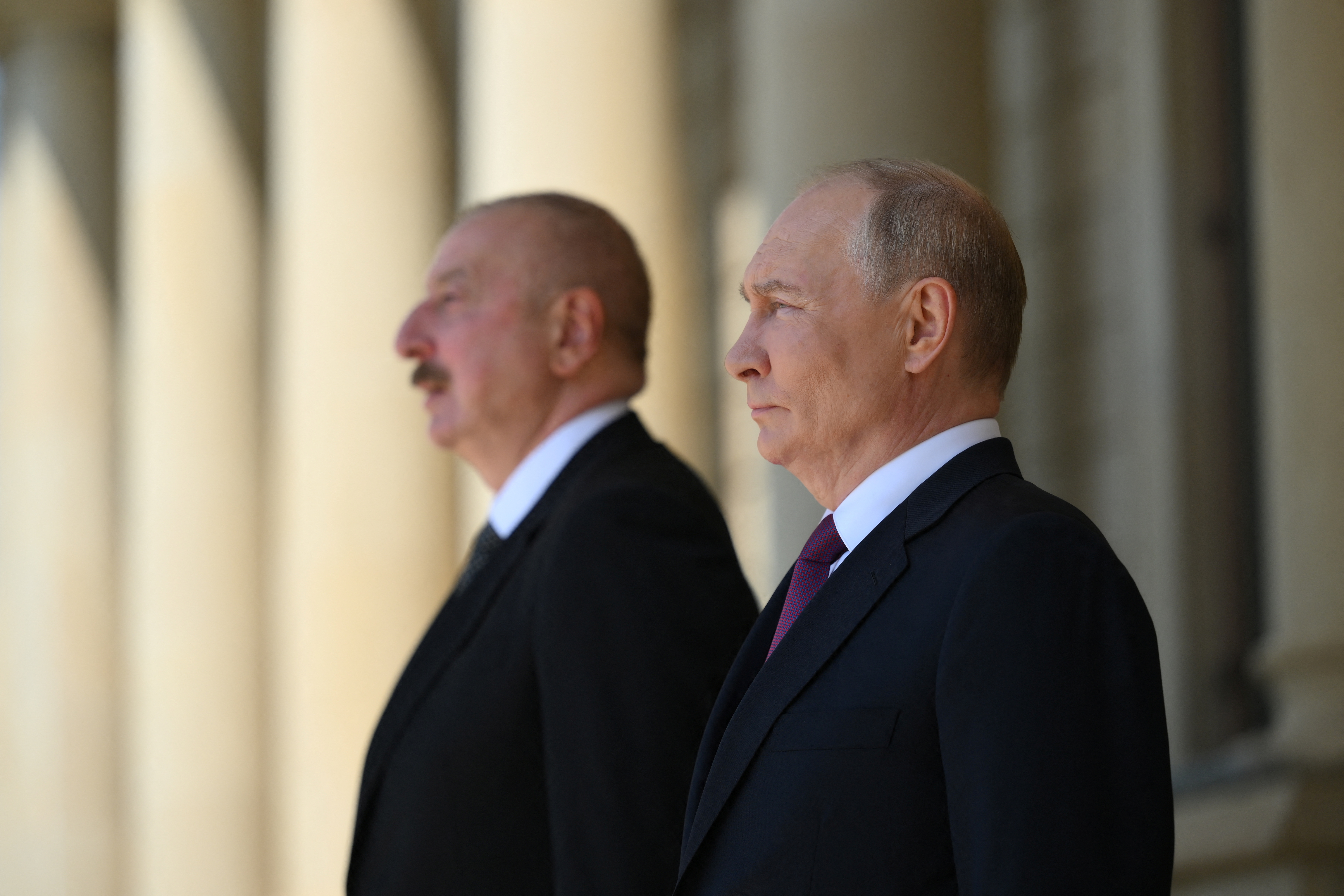 Russia's President Putin meets with Azerbaijan's President Aliyev at a residence outside Baku