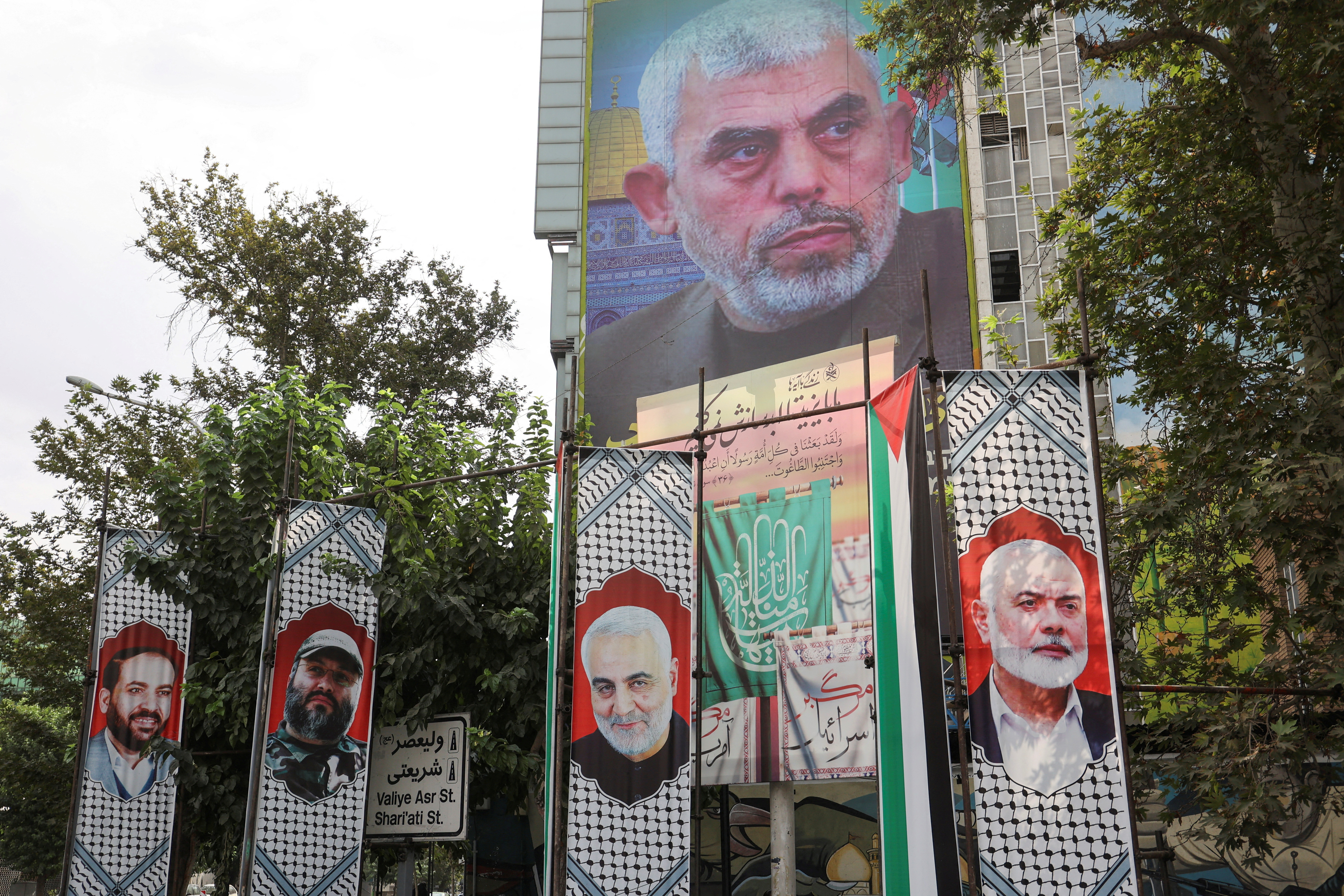FILE PHOTO: A billboard with a picture of newly appointed Hamas leader Yahya Sinwar is displayed