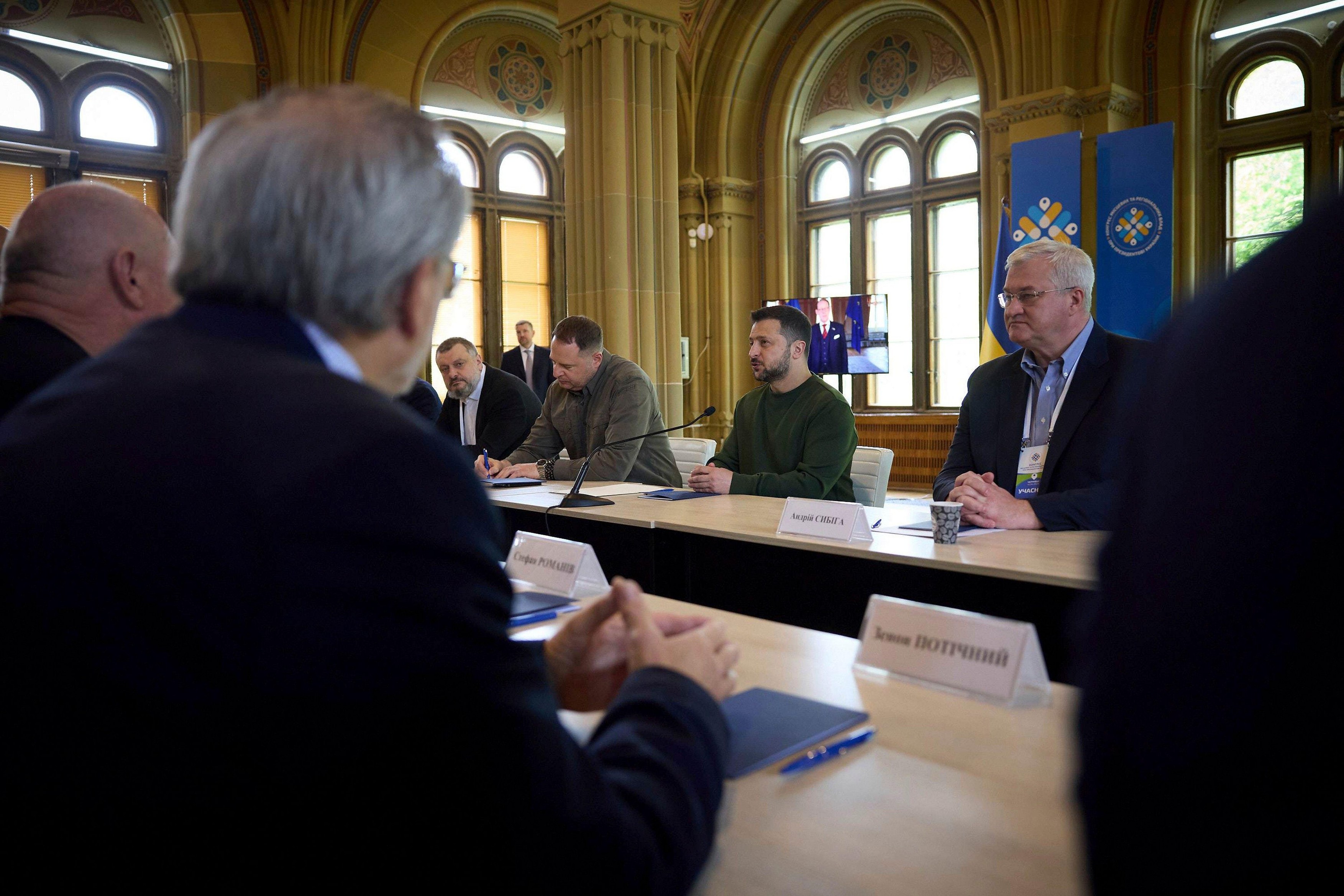 Chernivtsi, Ukraine. 12th Apr, 2024. Ukrainian President Volodymyr Zelenskyy, center, holds a face-to-face meeting with a delegation of the Ukrainian World Congress that arrived from Bucharest, where the UWC Summit is taking place, April 12, 2023 in Chern