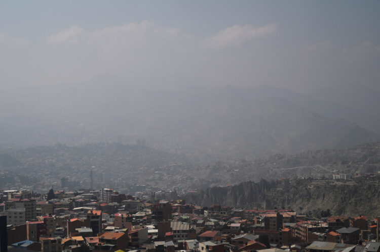 A smoky shroud from wildfires engulfs La Paz