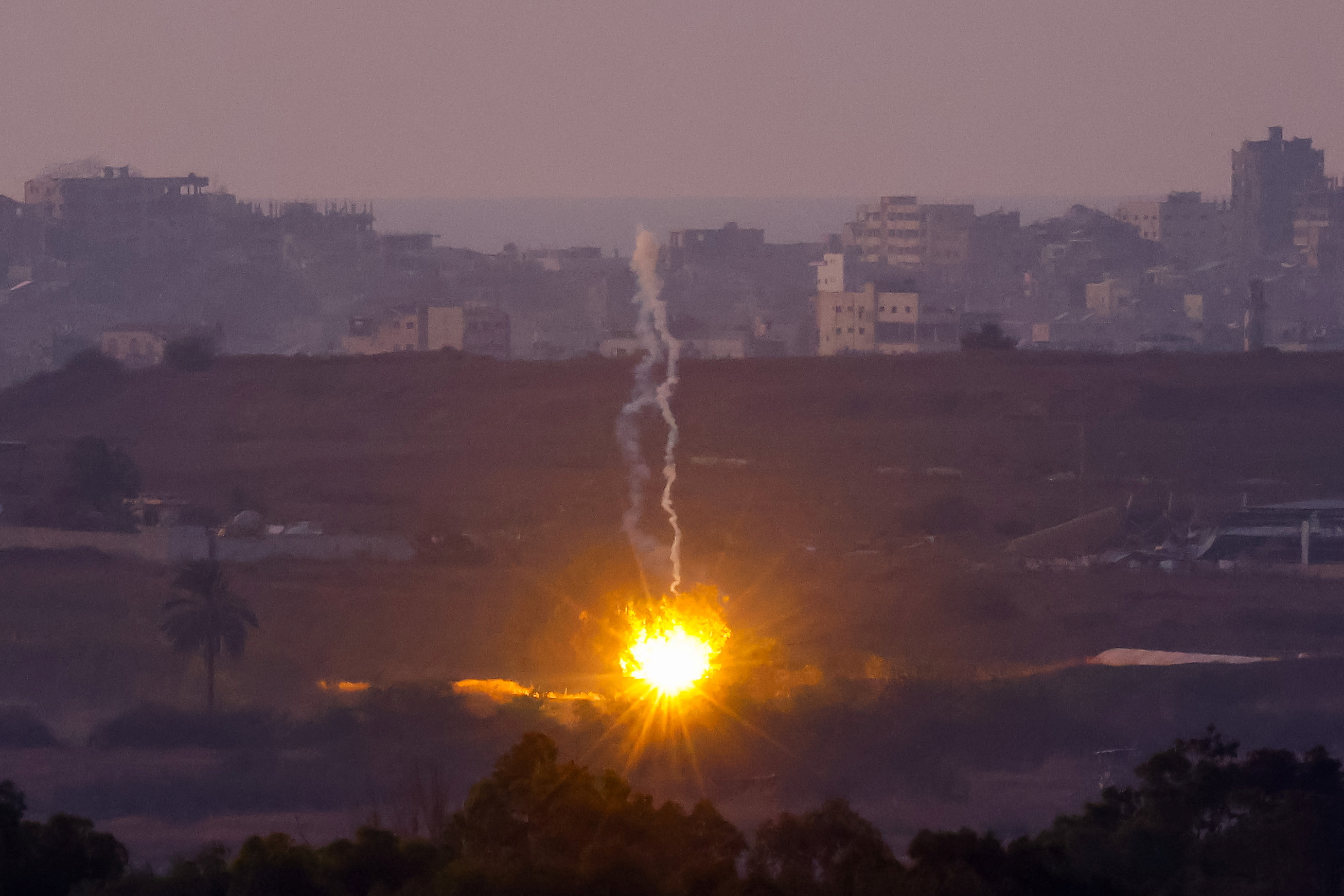 A flare falls in central Gaza, amid the Israel-Hamas conflic