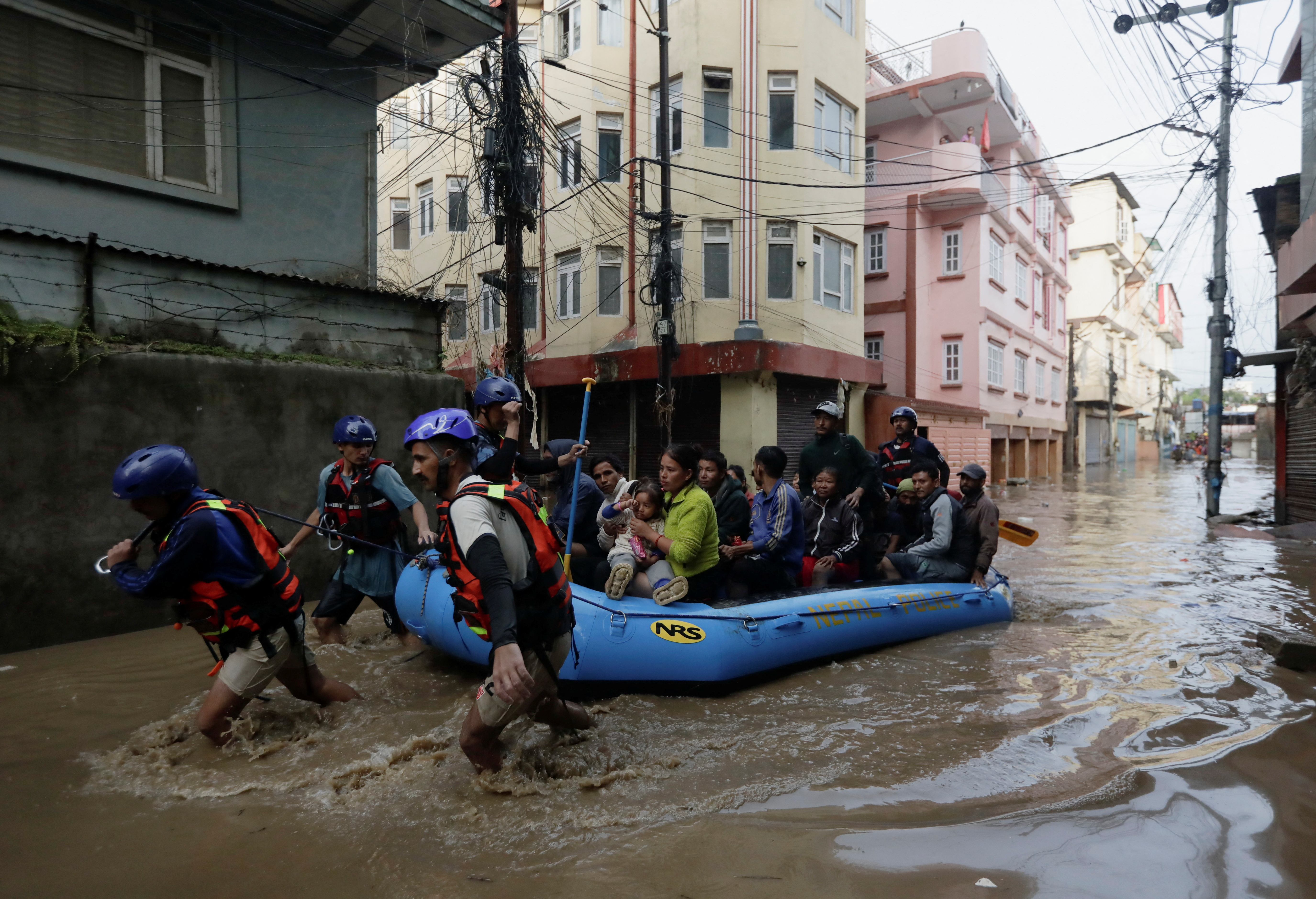 Flood along the bank of overflowing Bagmati River following heavy rains in Kathmandu