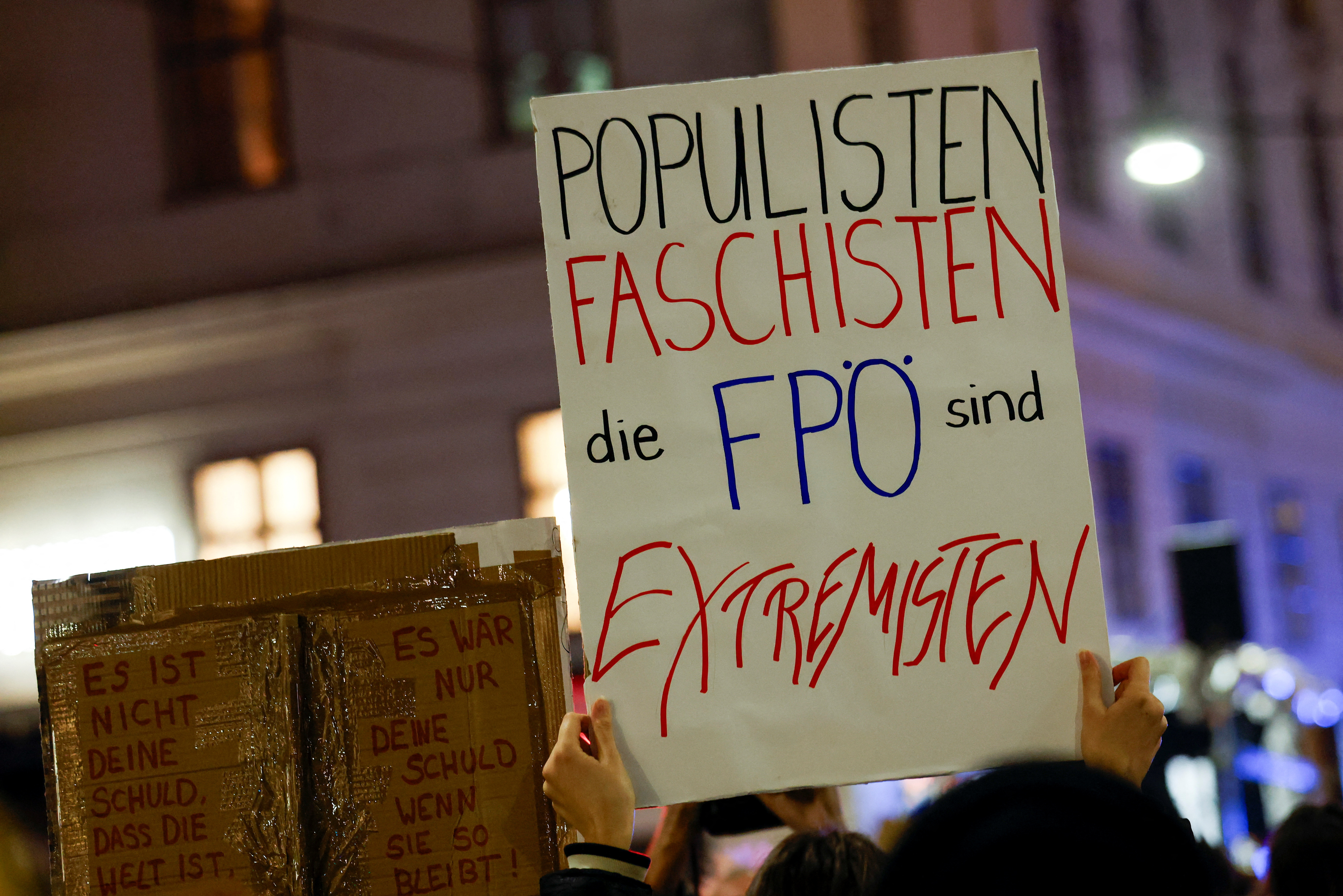 People attend a protest against Freedom Party after general elections in Vienna