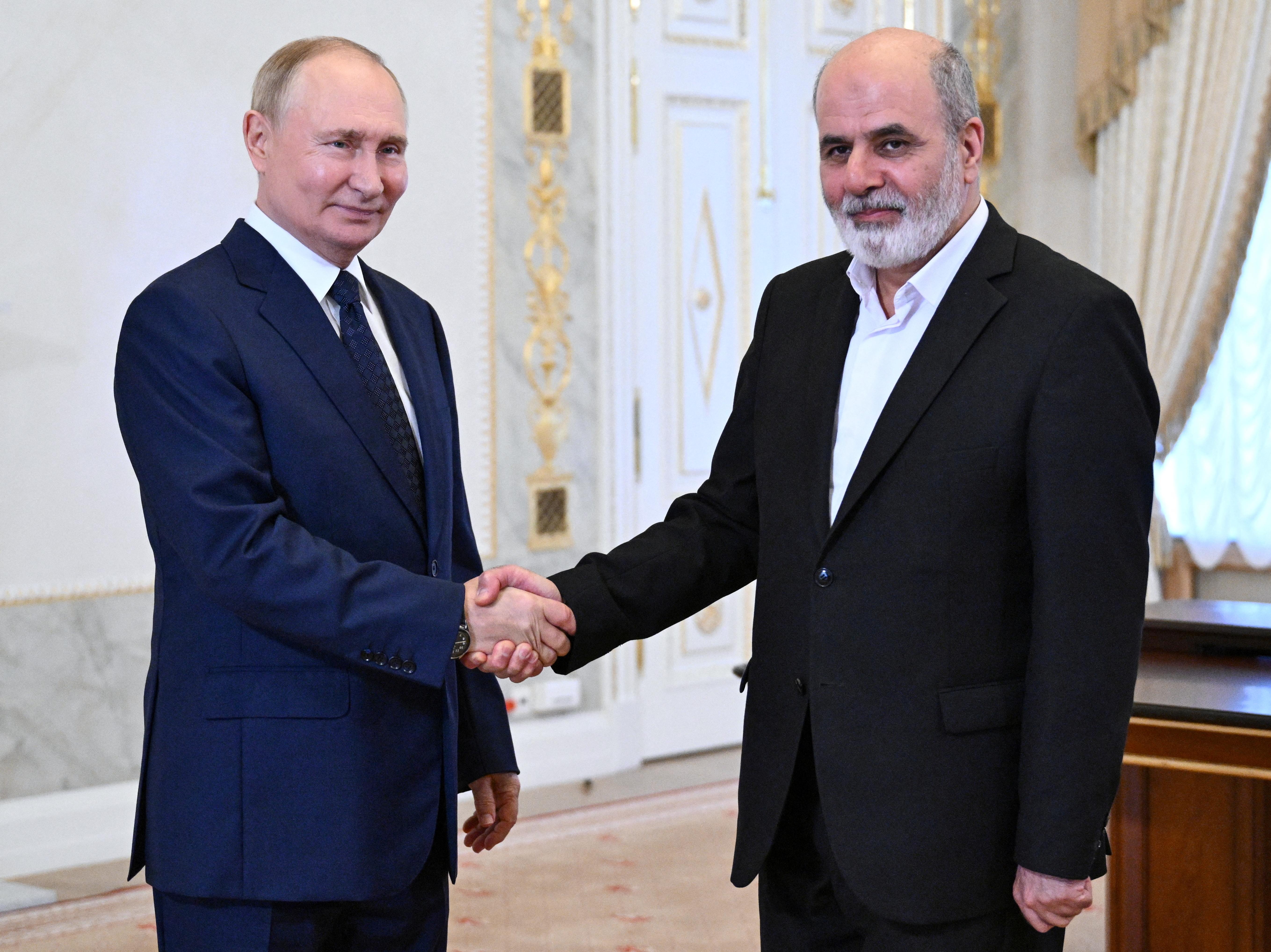 Russia's President Vladimir Putin meets with Iran's Supreme National Security Council Secretary Ali Akbar Ahmadian in Saint Petersburg