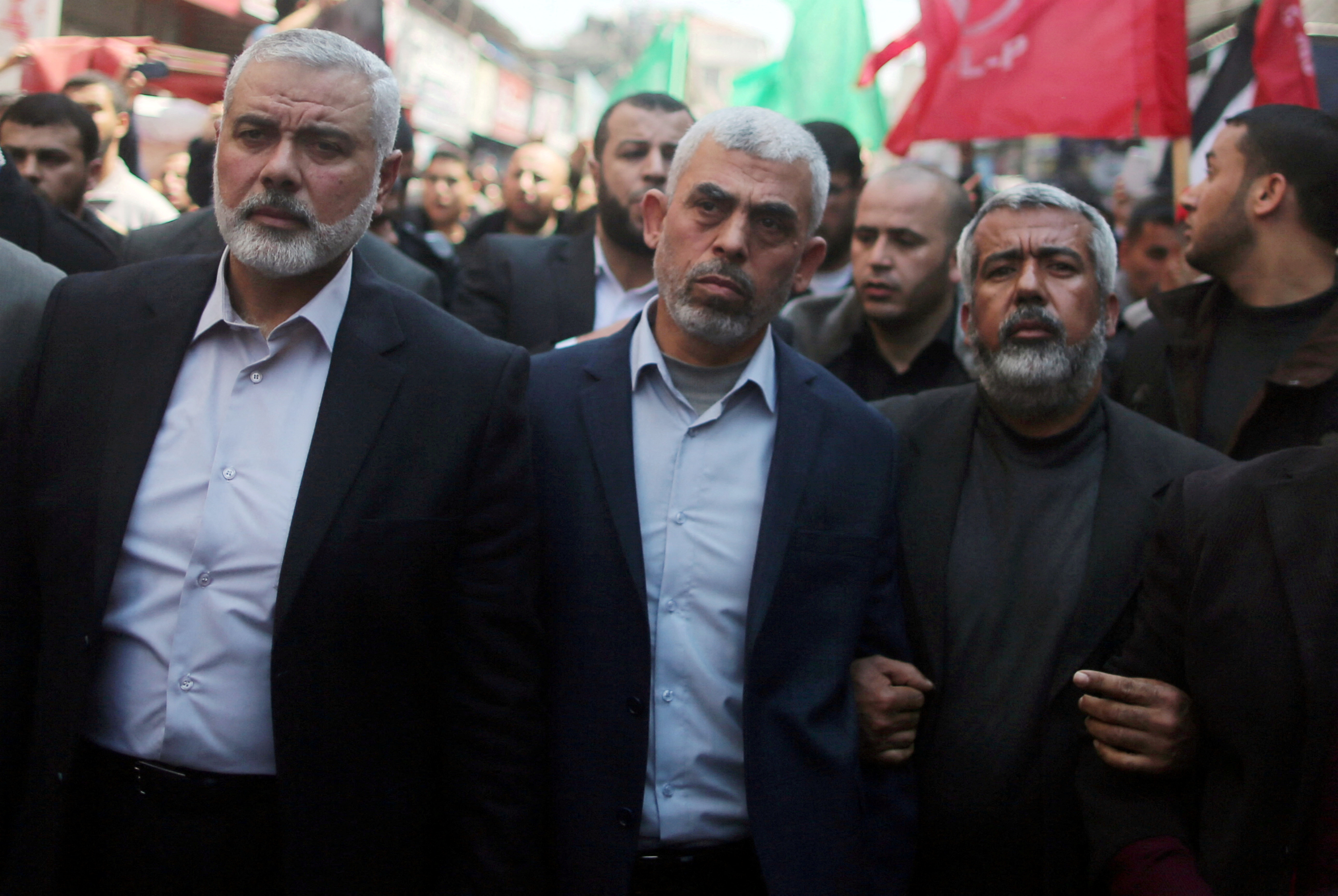 FILE PHOTO: Hamas Gaza Chief Yahya Sinwar and Hamas leader Ismail Haniyeh take part in the funeral of senior militant Mazen Fuqaha in Gaza City